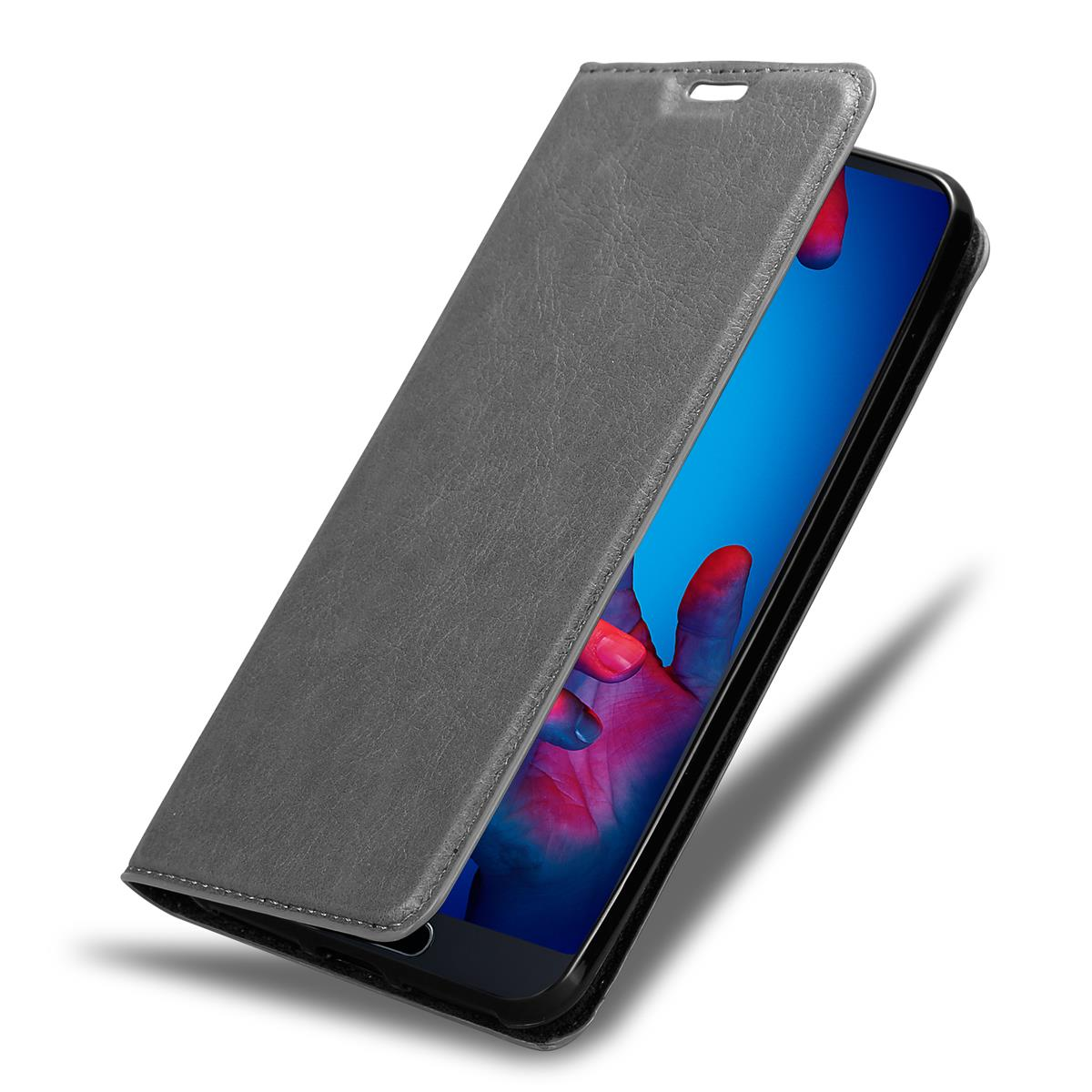 Graue Handyhülle mit geöffneter Abdeckung. Telefon innen, zeigt blaues und rotes Bild.