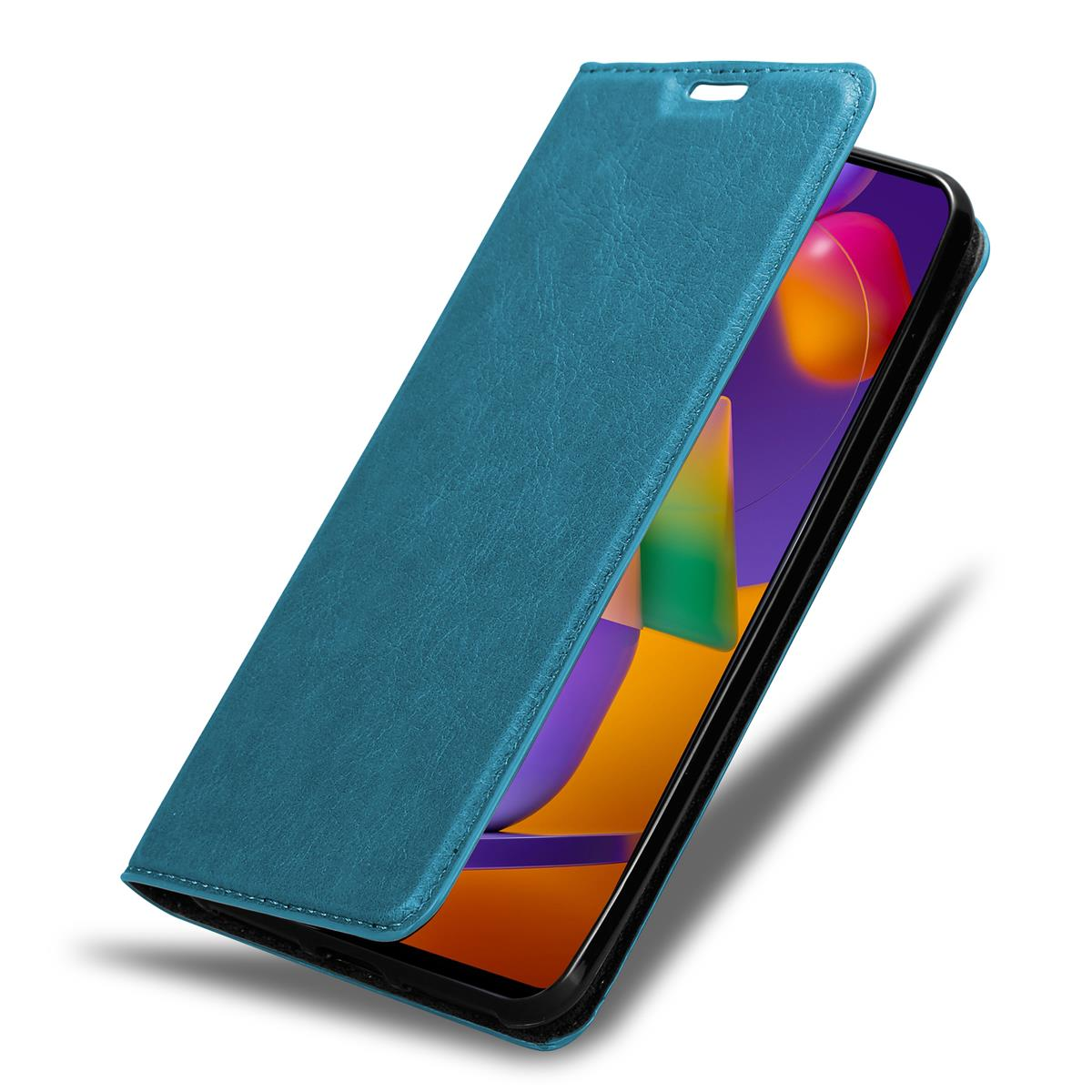 Teal Handyhülle geöffnet, wodurch ein Telefon mit lila Hintergrund sichtbar wird.