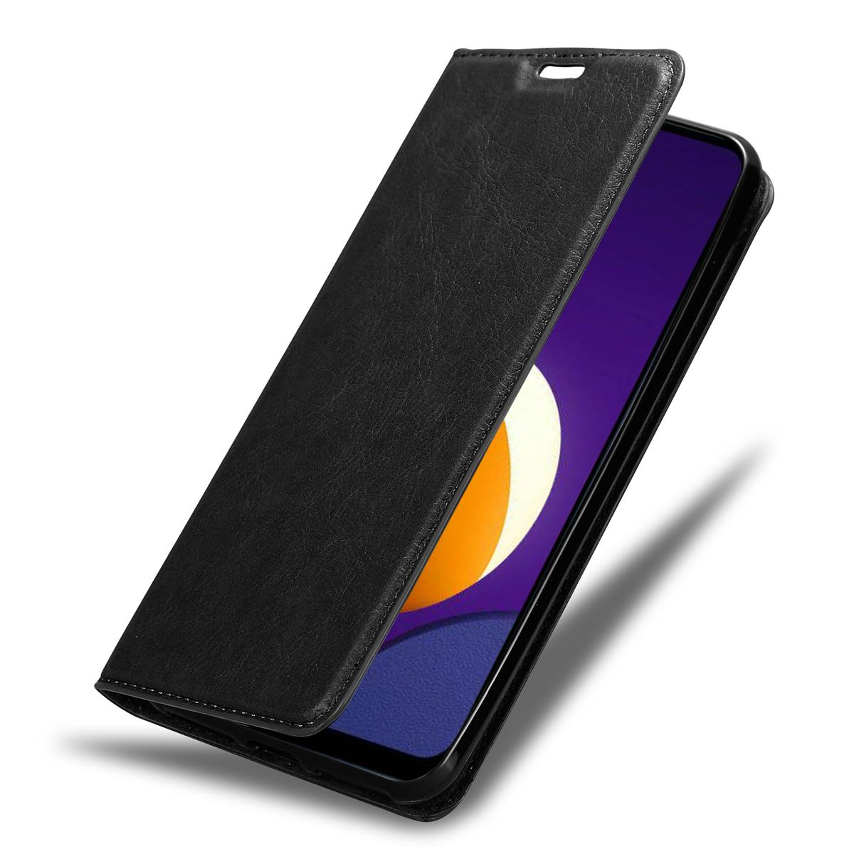 Schwarze Handyhülle mit einem Telefon darin. Das Telefon zeigt einen lila-schwarzen Bildschirm.