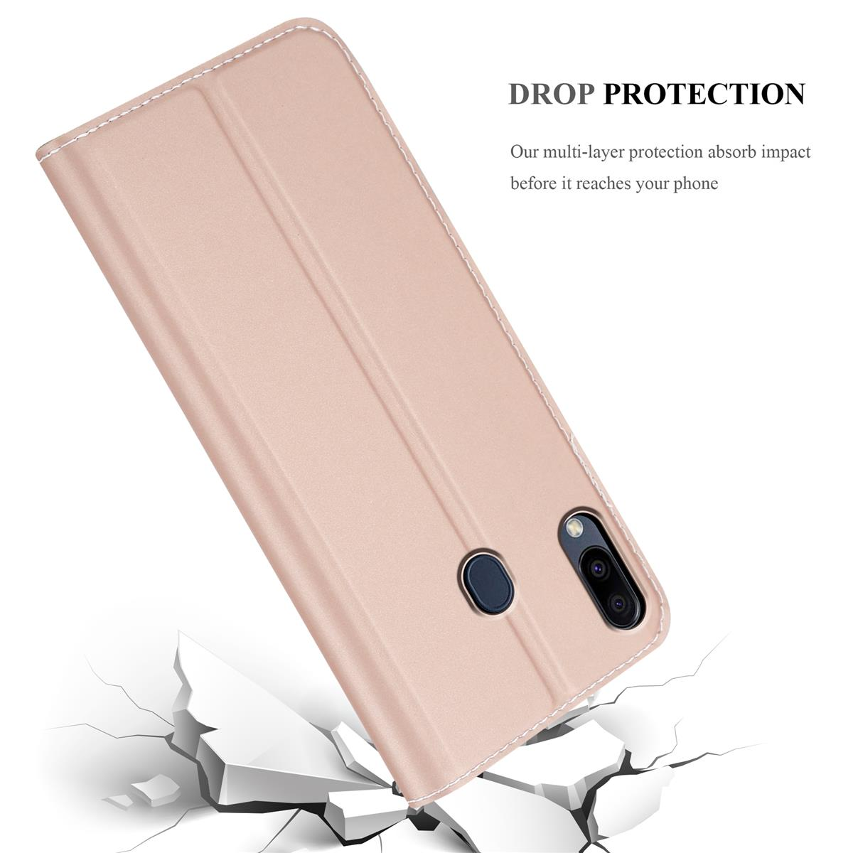 Rosa Handyhülle mit Telefon darin, das eine Oberfläche durchbricht. Text: DROP PROTECTION.