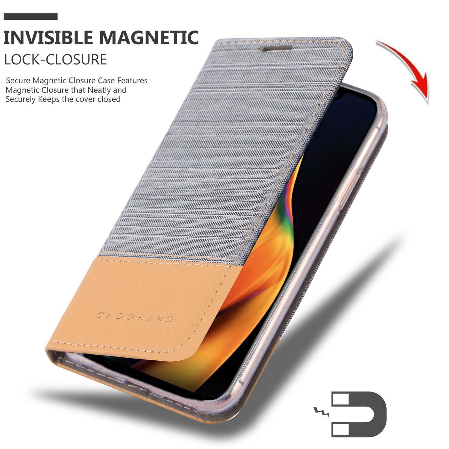Eine graue Handyhülle mit einer hellbraunen Klappe. Zeigt den Magnetverschluss mit einem Telefon im Gehäuse.