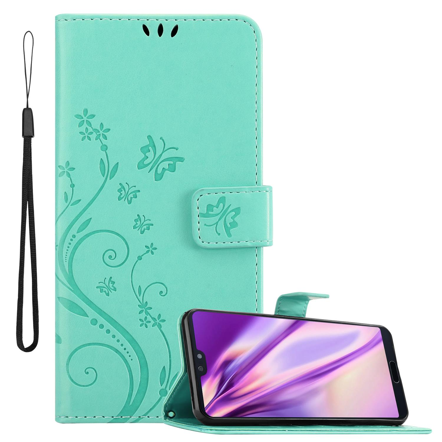 Türkisfarbene Handyhülle mit Telefon darin. Hülle hat Schmetterling- und Blumendesign.