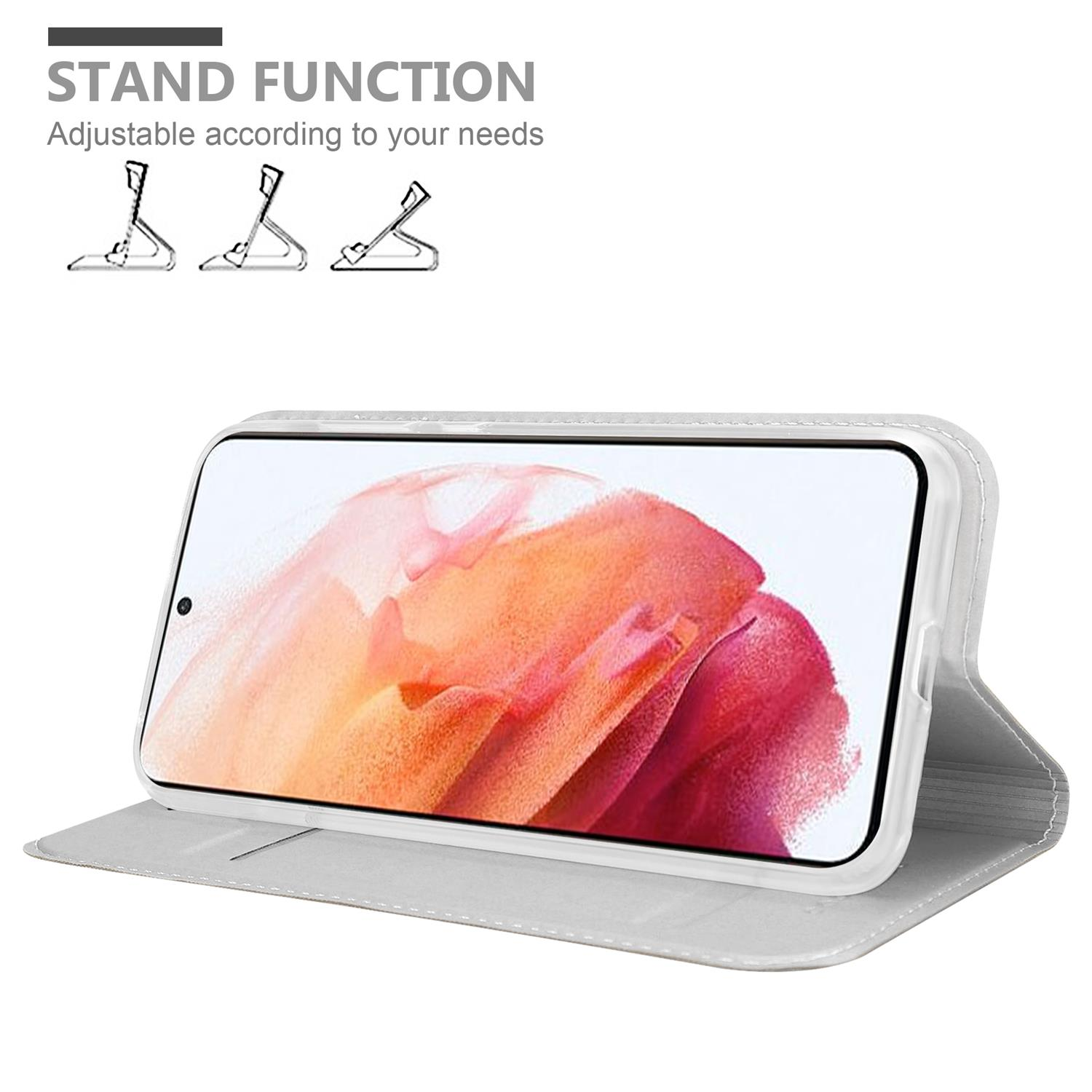 Weiße Handyhülle mit Telefon darin auf weißer Oberfläche. Die Handyhülle befindet sich in der Standposition.
