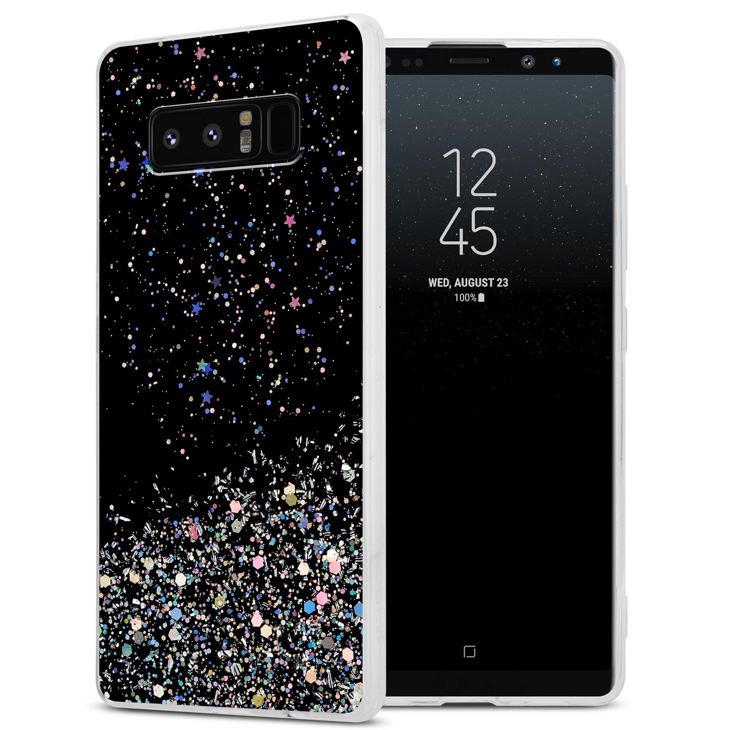 Ein schwarzes Telefon mit glitzerndem Gehäuse, das einen Bildschirm mit Uhrzeit und Datum zeigt.