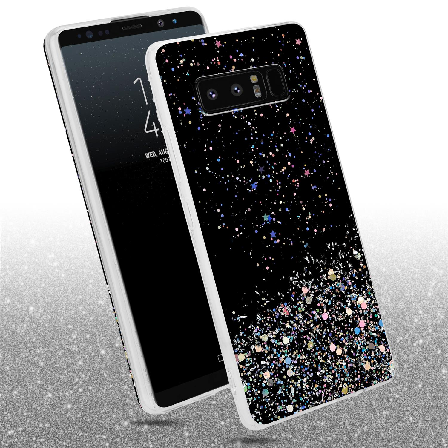 Handyhülle mit Glitzer- und Sterndesign. Telefon links, Glitzer rechts.