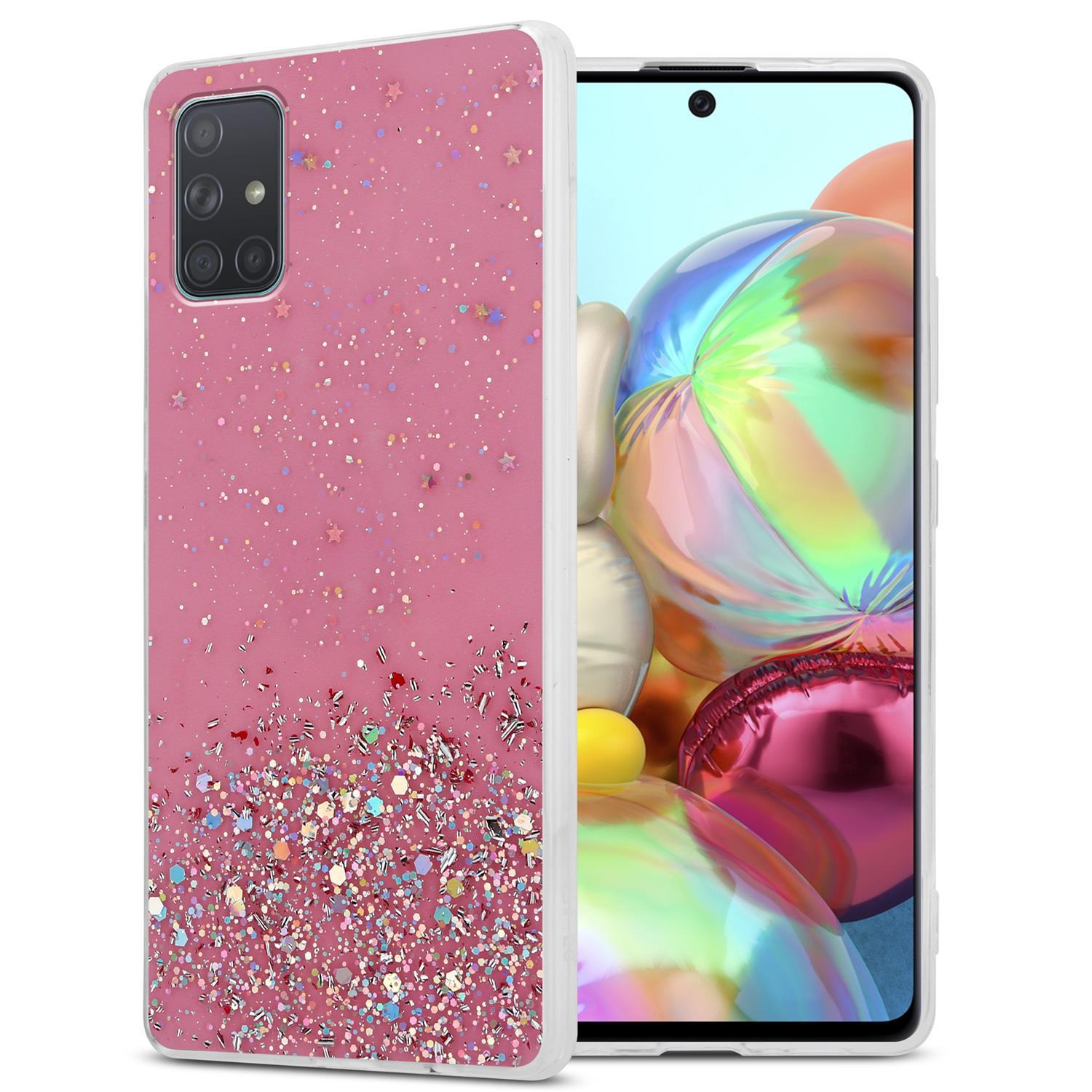 Rosa Handyhülle mit Glitzer und Sternen. Telefon ist in der Hülle. Weißer Hintergrund.