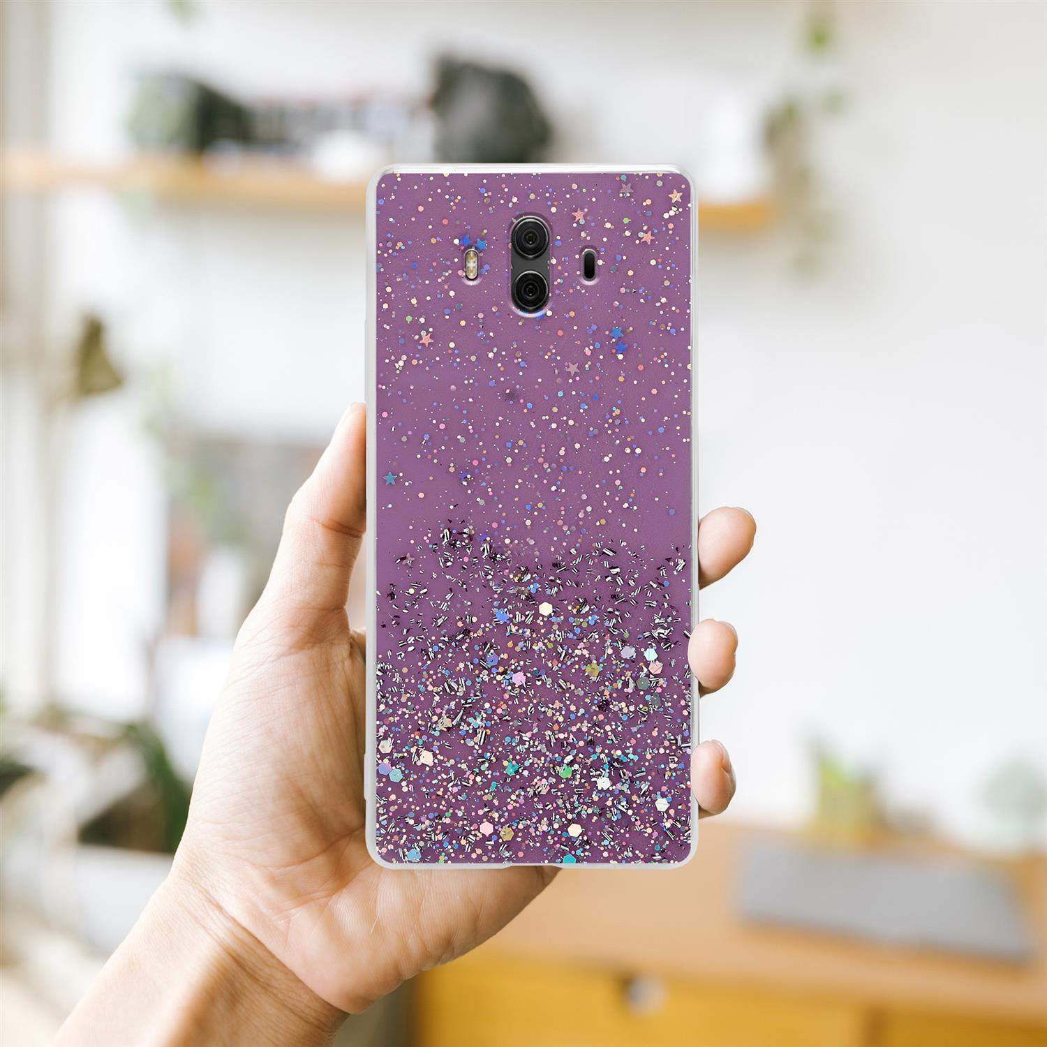 Eine Hand, die eine Handyhülle mit lila Glitzerdesign hält.