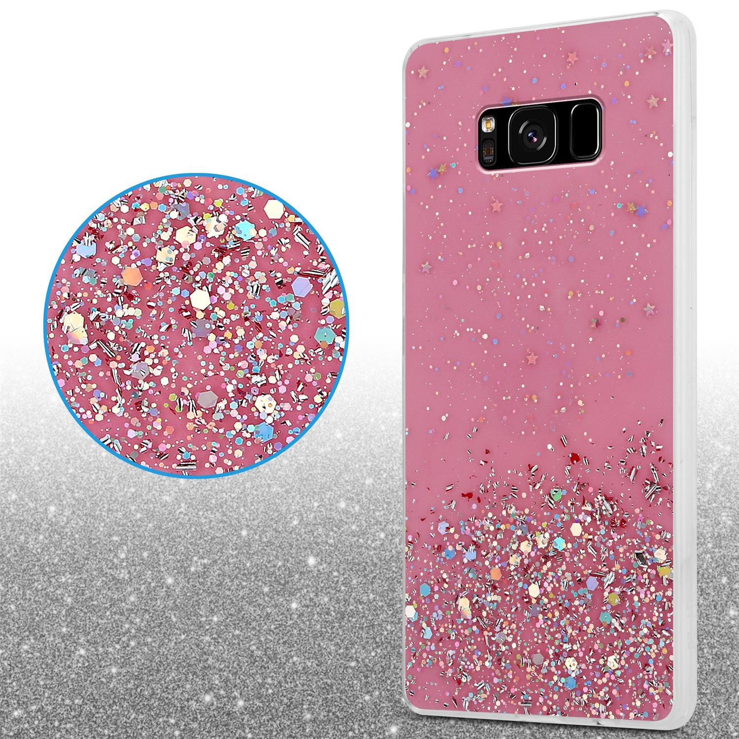 Eine pinke Handyhülle mit Glitzer. Ein runder Ausschnitt zeigt die Glitzerdetails.