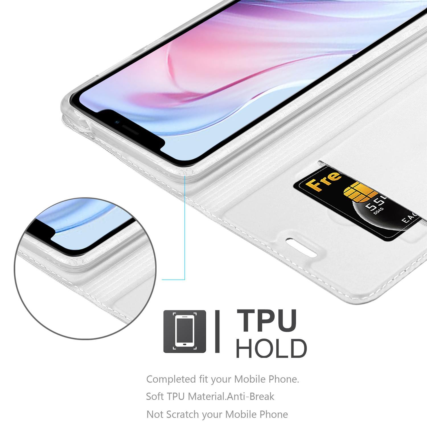 Nahaufnahme einer weißen Handyhülle als Portemonnaie. Eine SIM-Karte ist drin. Text: TPU HOLD.