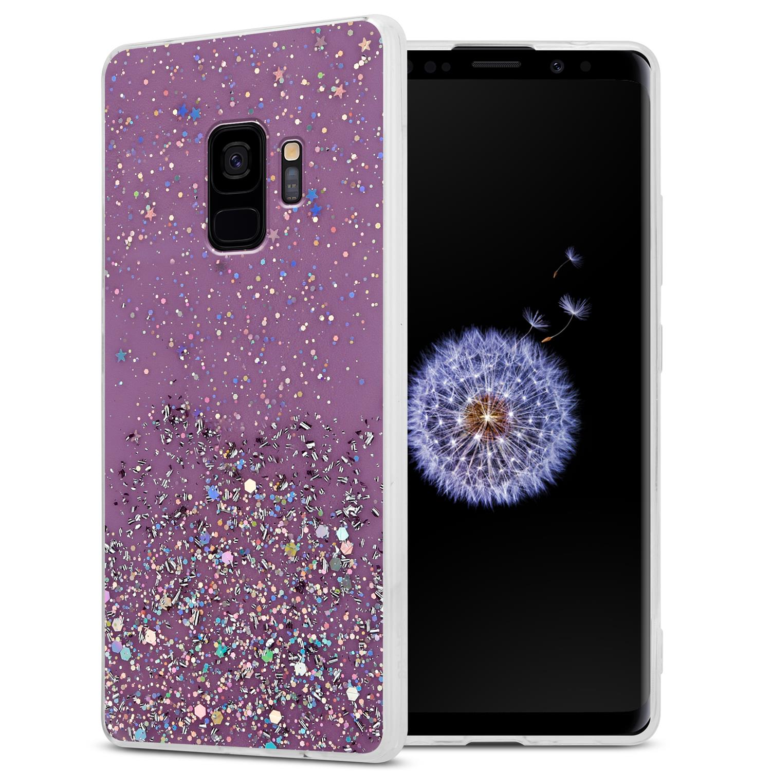 Lila Handyhülle mit Glitzer und Telefon. Hülle bedeckt das Telefon.