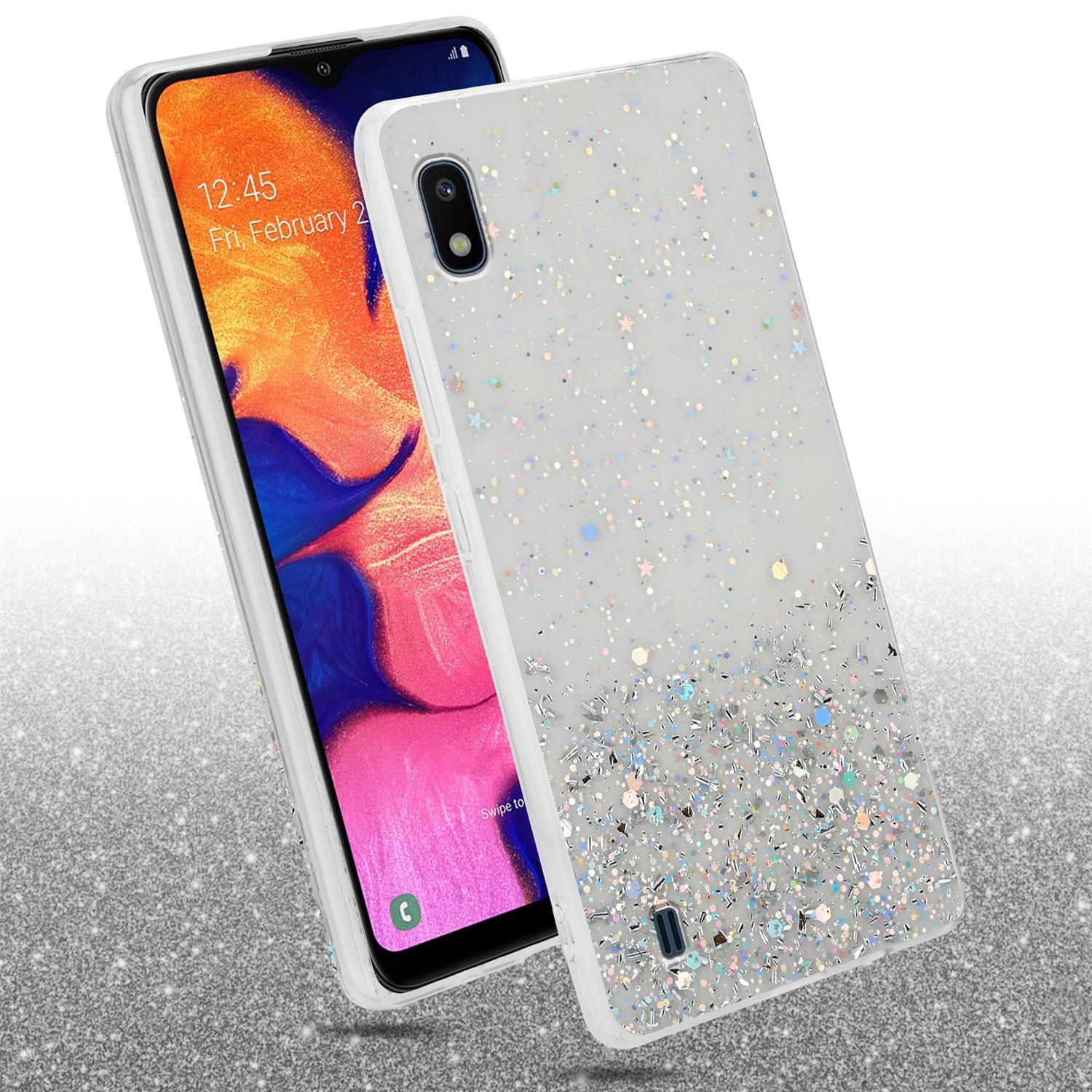 Telefon und Hülle mit Glitzer. Telefon ist weiß mit einer Hülle mit Glitzer am Boden.