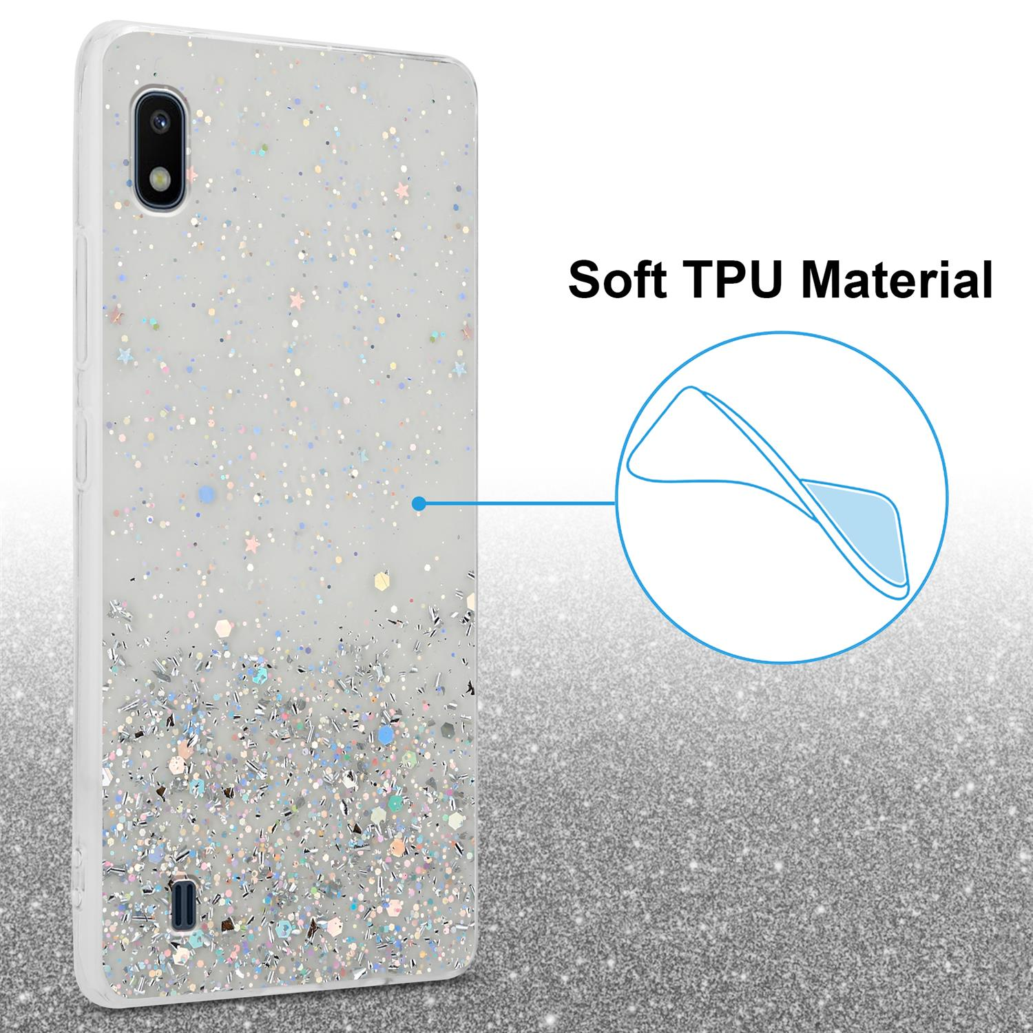 Eine weiße Handyhülle mit Glitzer auf glitzerndem Hintergrund. Text lautet Weiches TPU-Material.
