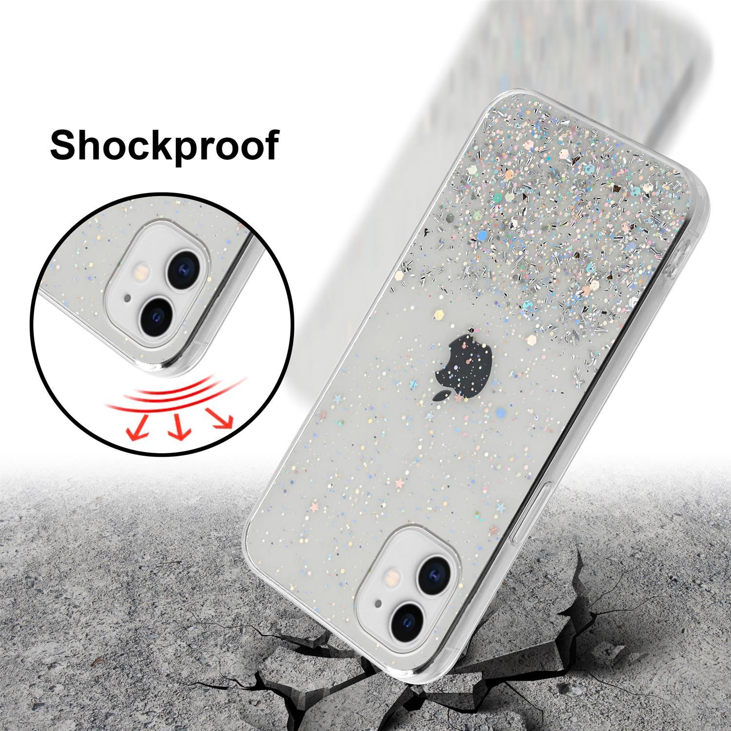 Eine Handyhülle mit Glitzerdesign auf einer zerbrochenen Oberfläche.