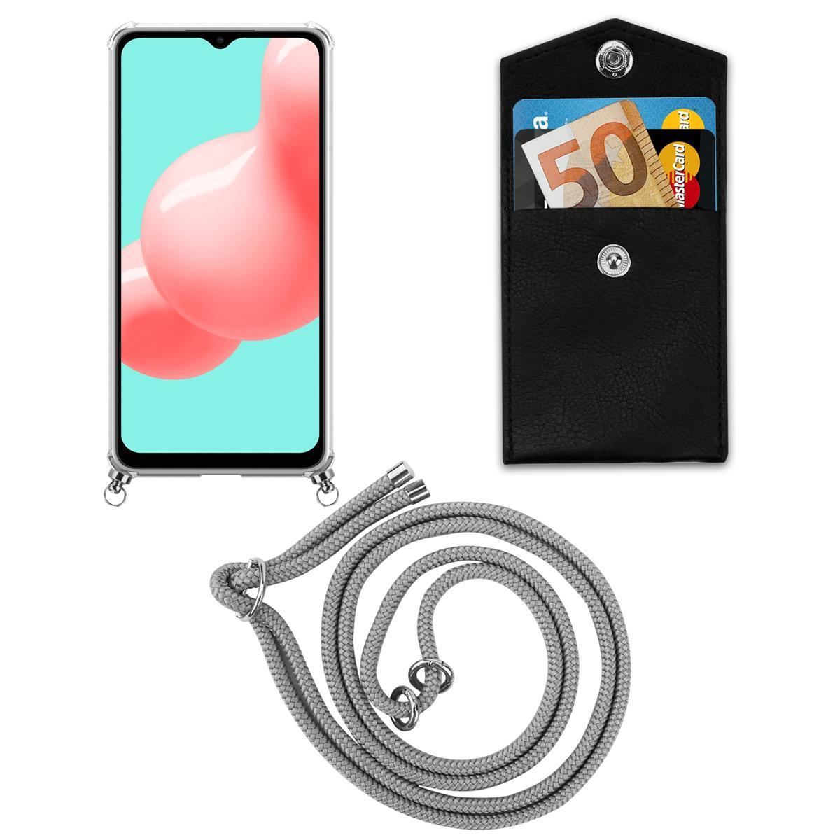 Telefon und schwarzes Etui mit Lanyard, hält 50 Euro Schein und Mastercard. Graues Lanyard sichtbar.