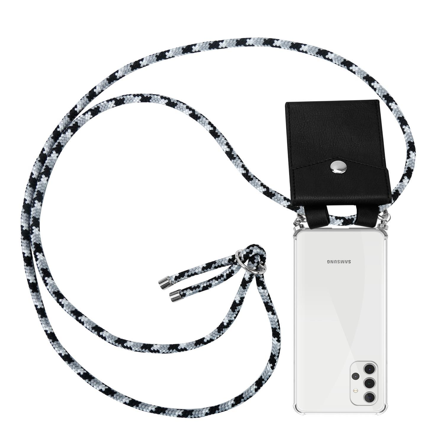 Telefon mit schwarz-weißem Seilriemen und schwarzer Hülle. Telefon in klarer Hülle.