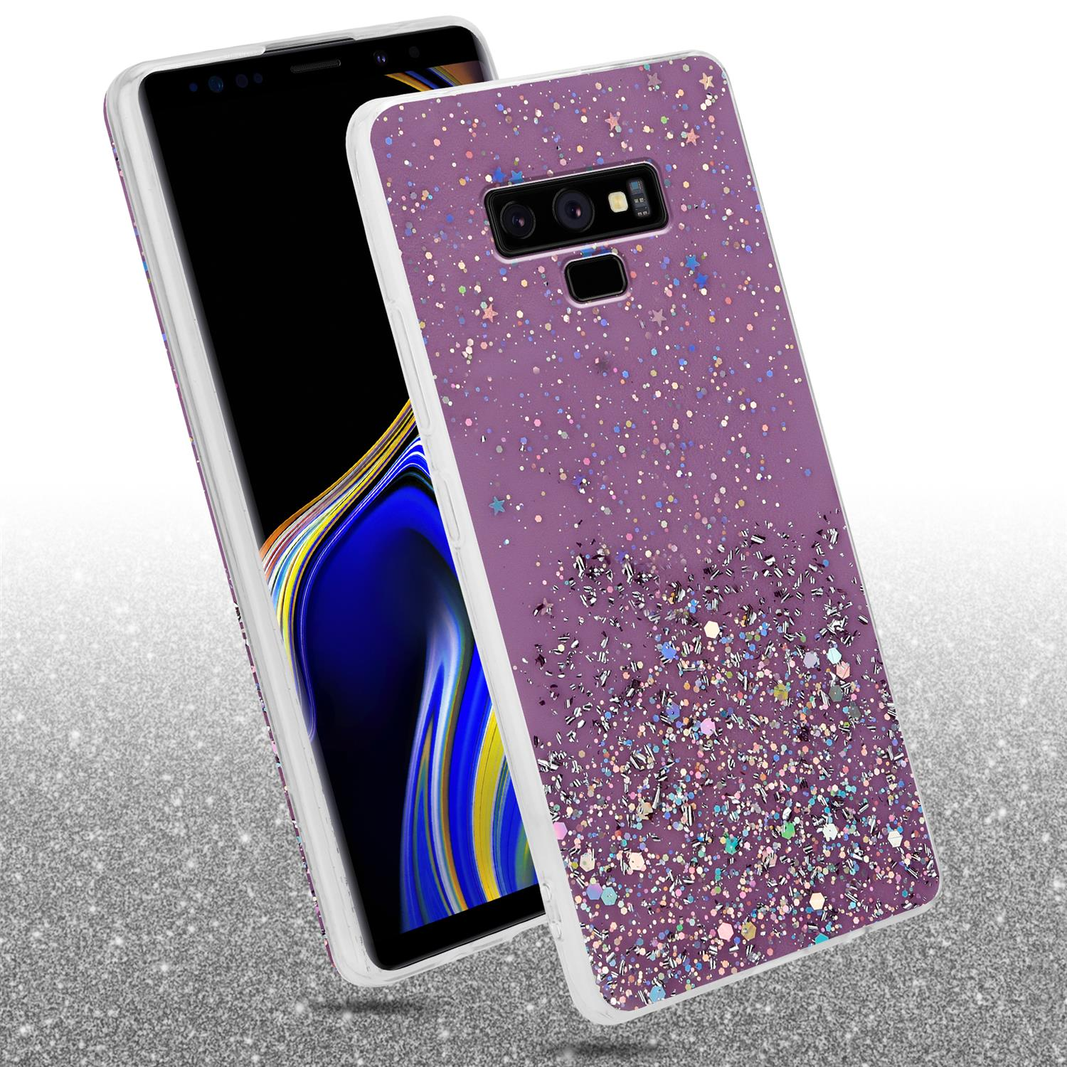 Lila Handyhülle mit Glitzer. Ein Telefon daneben mit schwarzem Bildschirm. Glitzerhintergrund.