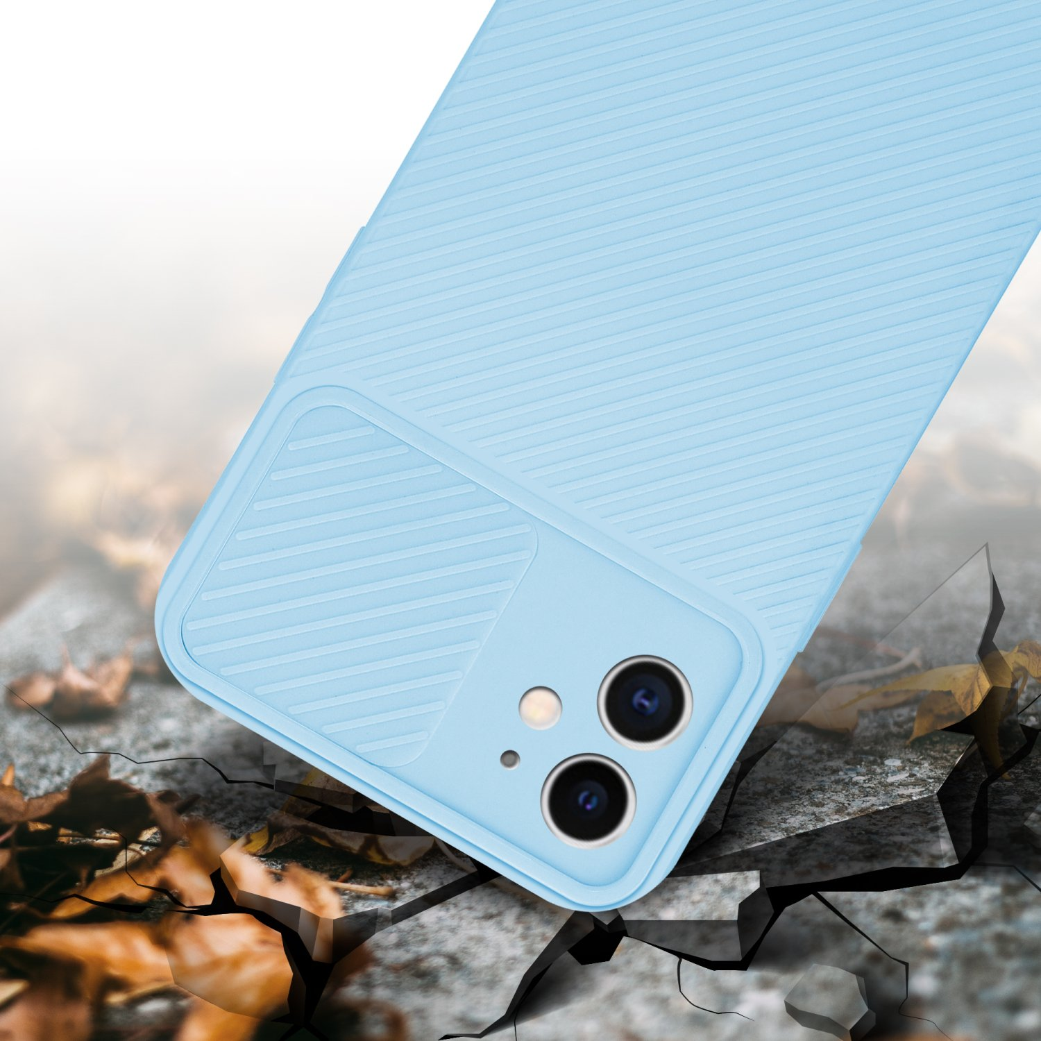 Custodia per telefono blu su una superficie incrinata. La custodia è di colore azzurro, superficie incrinata.