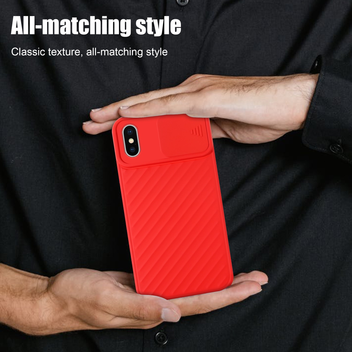 Eine rote Handyhülle, gehalten von einer Person, mit Kameraabdeckung und Design.