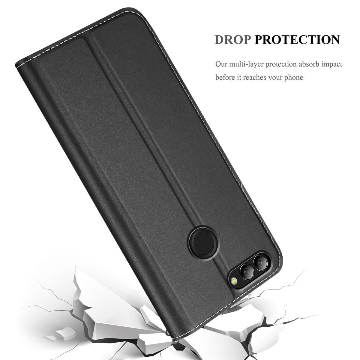 Coque de téléphone noire, coutures blanches, avec un téléphone. L'étui est sur une surface fissurée.