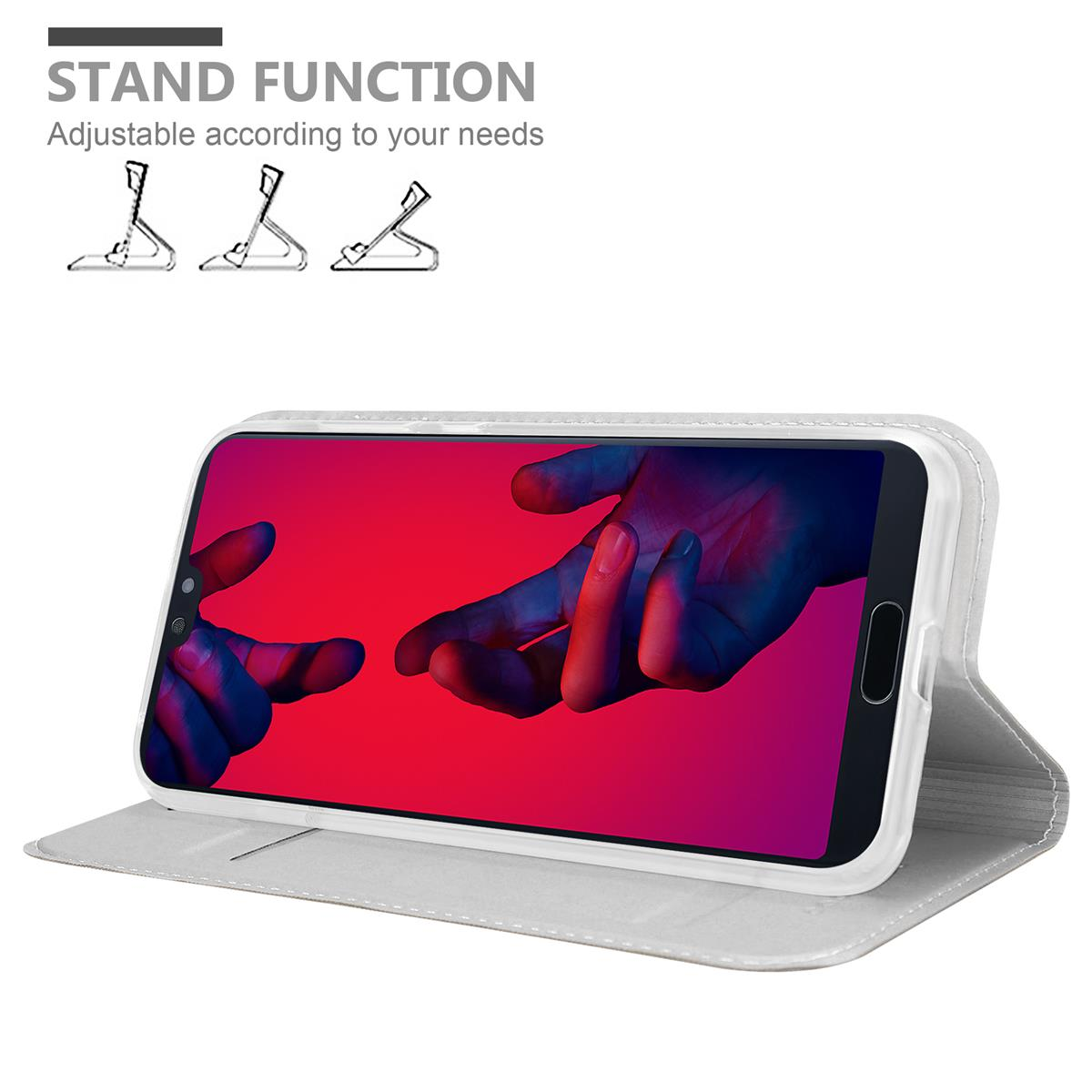 Ein Telefon befindet sich in einer weißen Hülle und ist aufgestellt. Der Telefonbildschirm zeigt ein farbenfrohes Bild. Der Text zeigt eine Standfunktion.