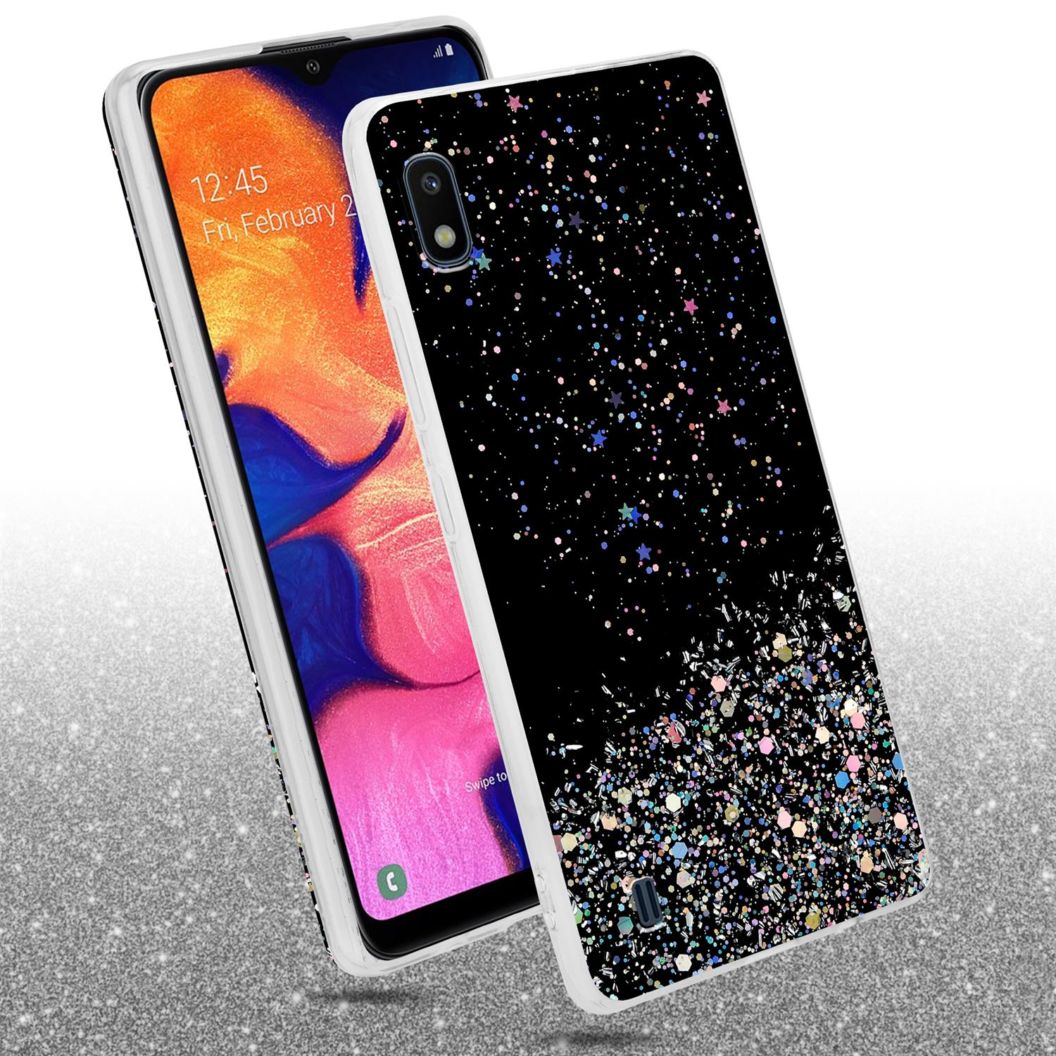 Schwarze Handyhülle mit Glitzerdesign, Telefon auf Glitzeroberfläche.
