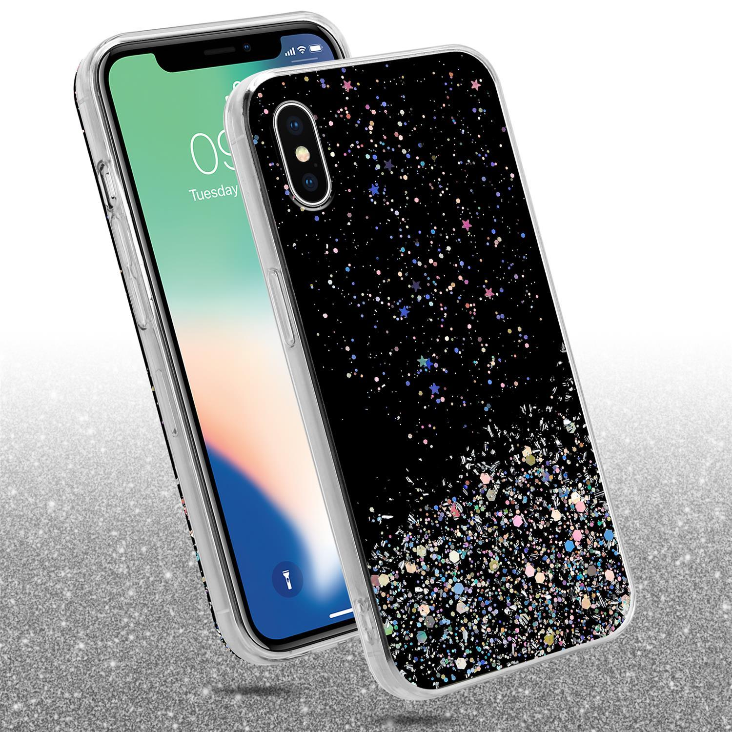 Telefon in schwarzer Hülle mit buntem Glitzer. Ein weiteres Telefon im Hintergrund.