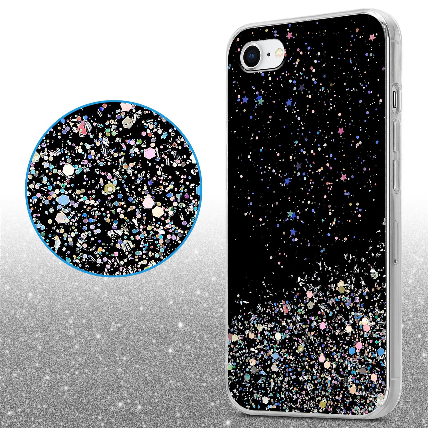Schwarze Handyhülle mit Glitzerdesign. Nahaufnahme zeigt Glitzerdetails. Der Hintergrund ist ebenfalls mit Glitzer bedeckt.