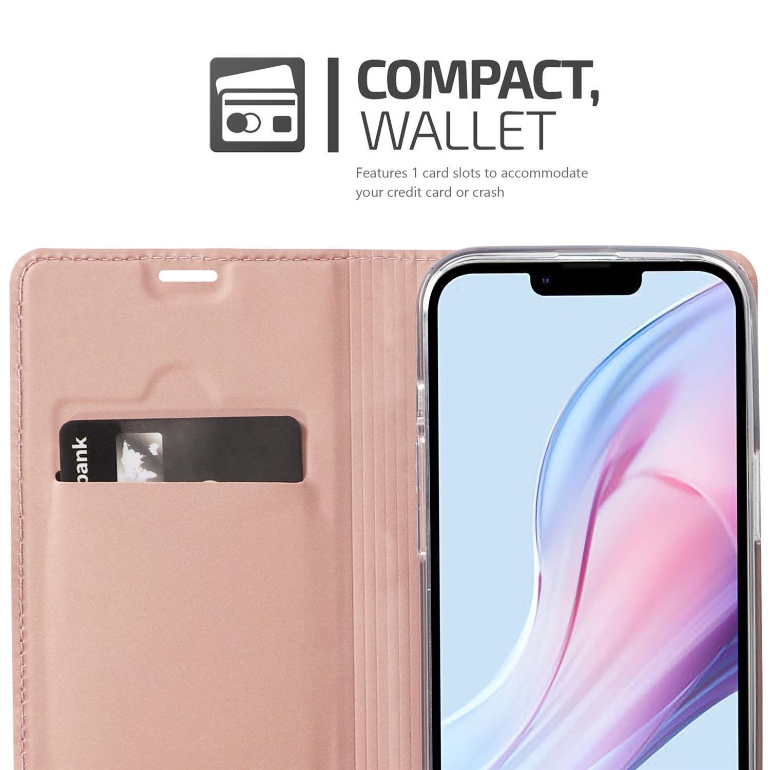 Eine Handyhülle mit Kartenfach. Die Hülle ist rosa. Die Brieftasche öffnet sich, um das Telefon und einen Kartensteckplatz mit einer Karte zu zeigen.
