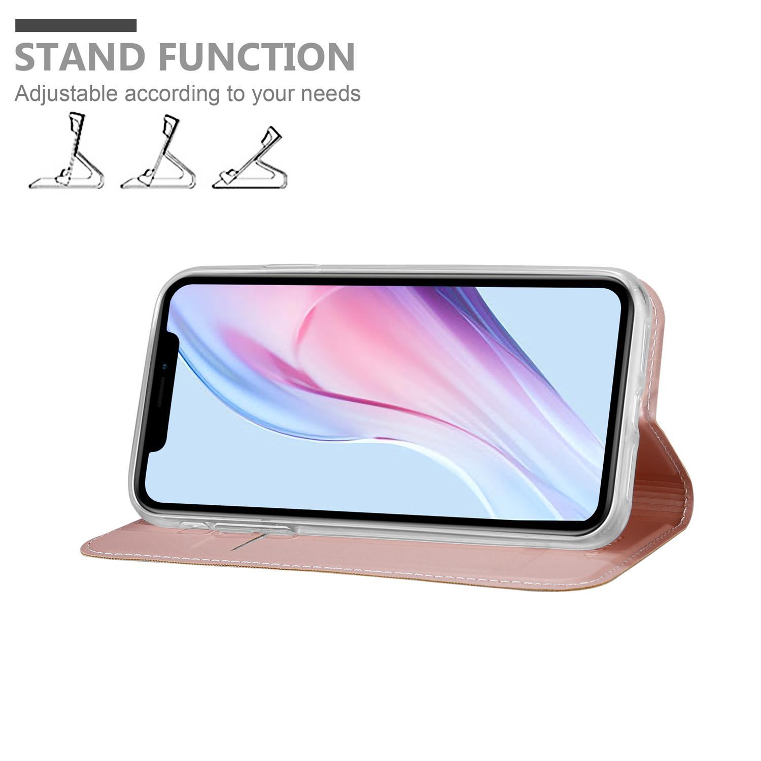 Eine Handyhülle mit Standfunktion. Das Telefon befindet sich in einer rosa Hülle und der Ständer ist aufgebaut.
