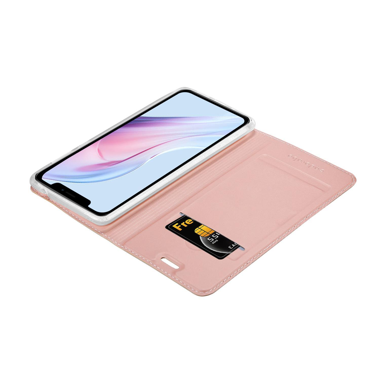 Rosa Handyhülle, offen, mit Telefon und SIM-Kartenhalter.