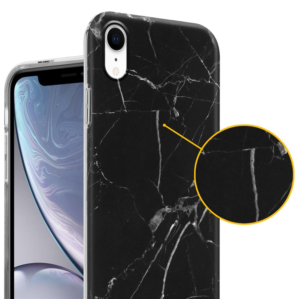Custodia per telefono in marmo nero con un telefono all'interno. Primo piano del motivo marmoreo.