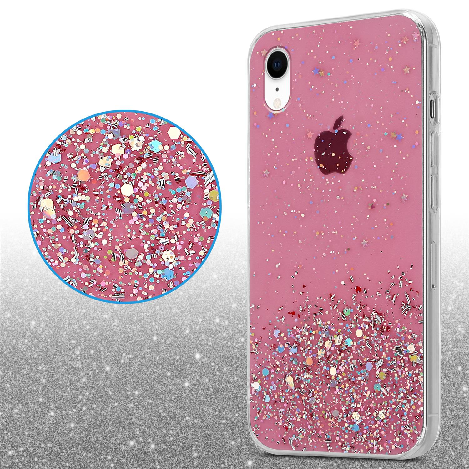 Telefon mit einer rosa Glitzerhülle und dem Apple-Logo. Glitzereffekt am Boden. Verschwommener Hintergrund.