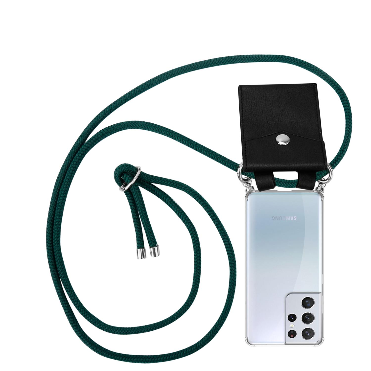 Telefon mit schwarzer Lederhülle und grüner Schnur. Das Telefon ist auf der rechten Seite.