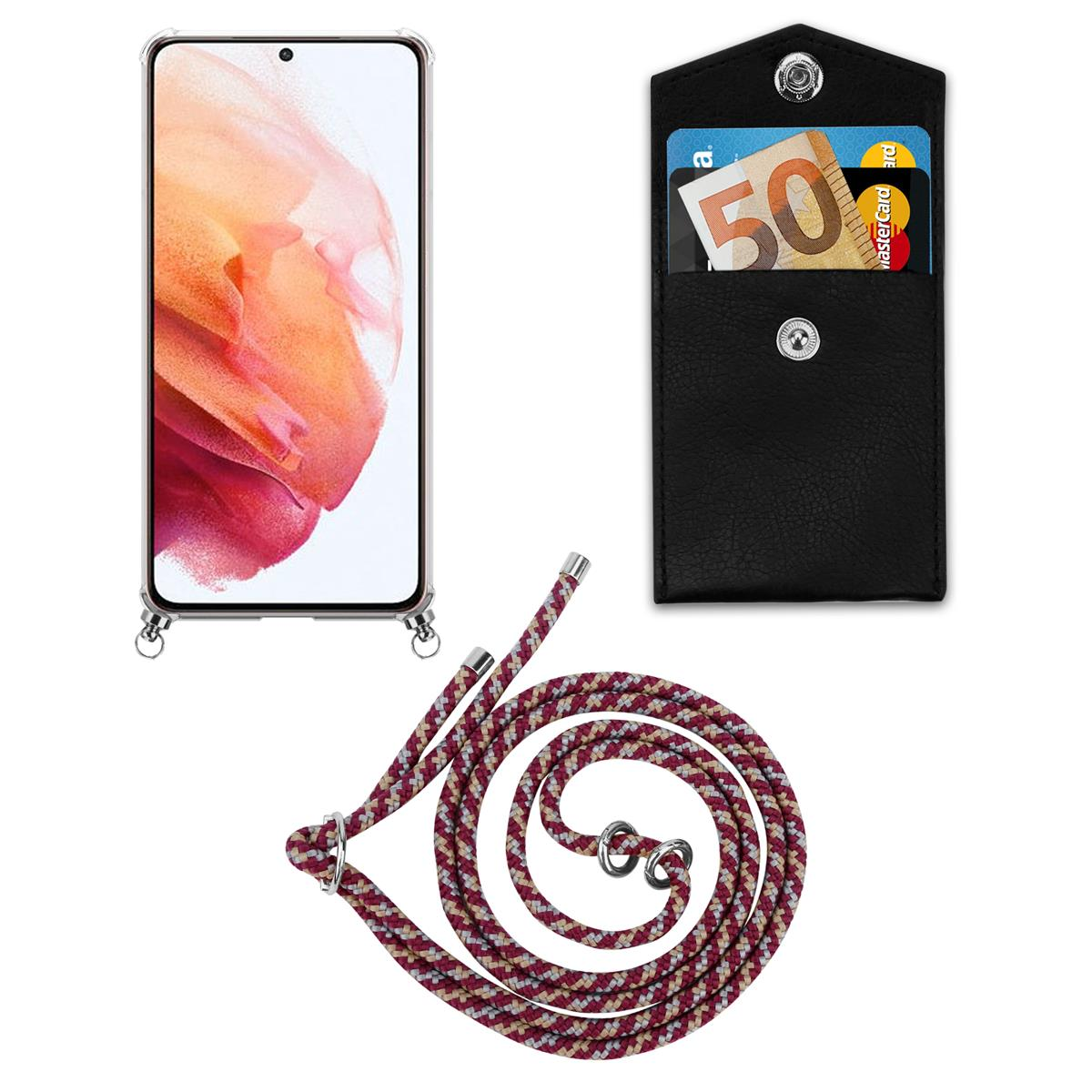 Eine transparente Handyhülle, ein Telefon und ein schwarzer Kartenhalter mit Karten und Lanyard.