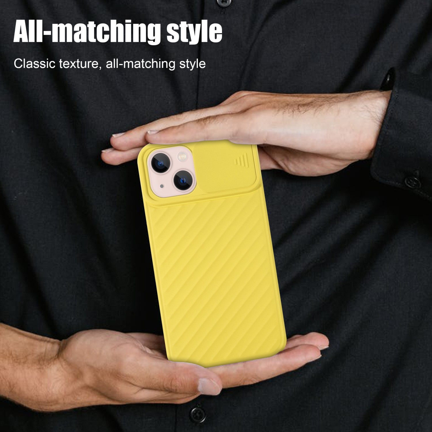 Una funda amarilla para teléfono con cubierta deslizante para la cámara. En la mano.