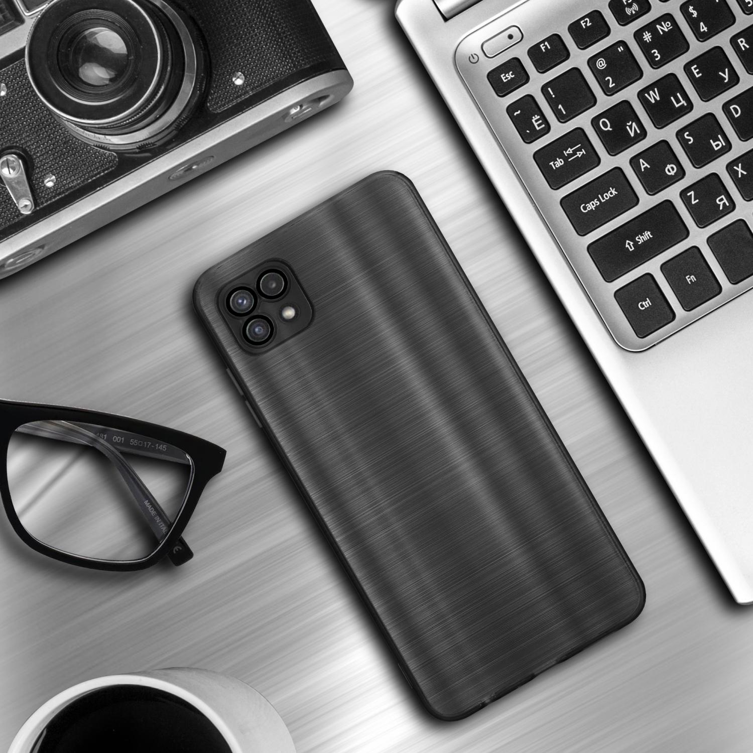 Schwarze strukturierte Handyhülle mit Kamera, Brille, Laptop und Kaffeetasse auf Metalloberfläche.
