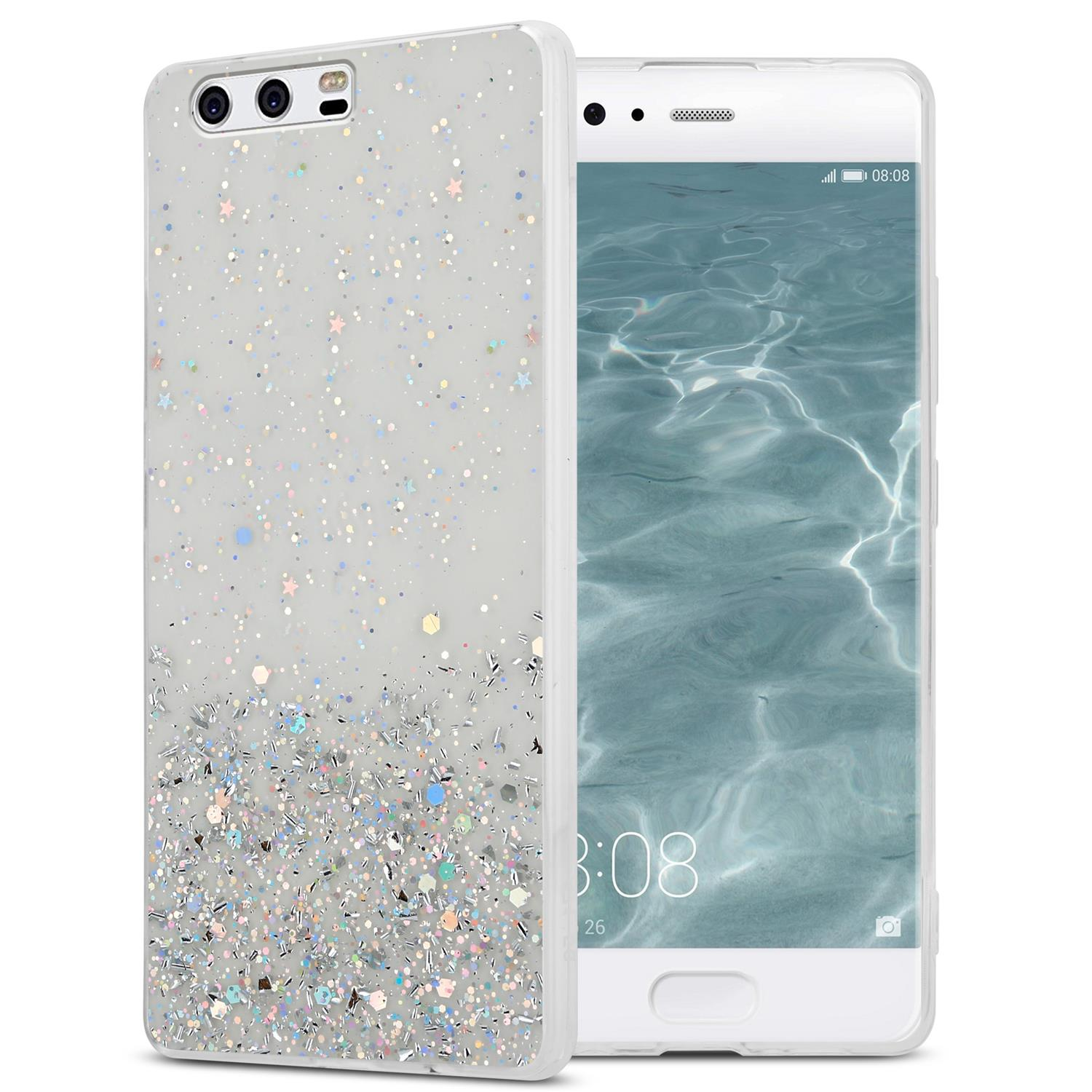 Telefon in einer durchsichtigen Hülle mit Glitzer. Das Telefon zeigt Datum und Uhrzeit auf dem Bildschirm.