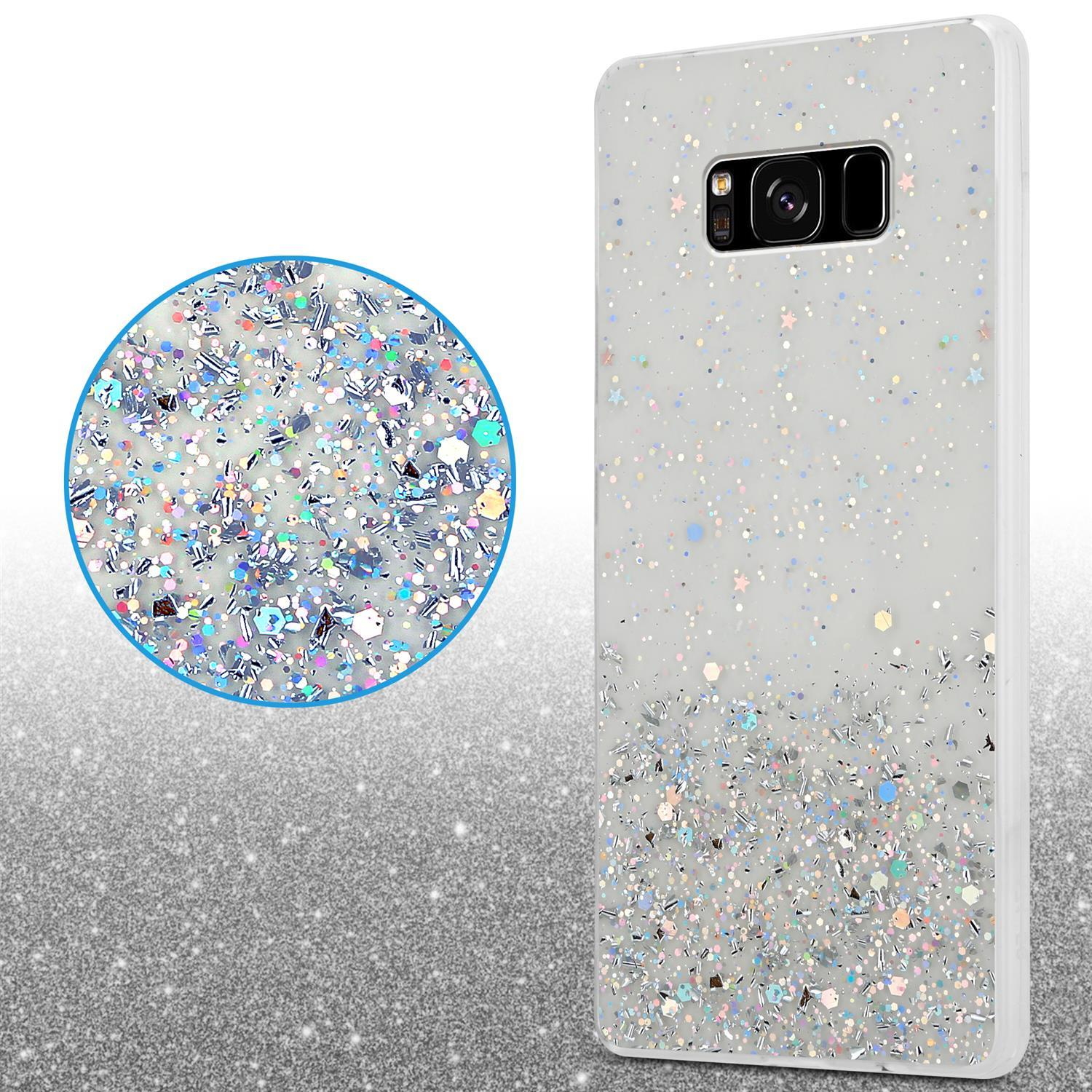 Weiße Handyhülle mit Glitzerdesign, Kreis hebt Glitzer hervor. Funkelnde Oberfläche.