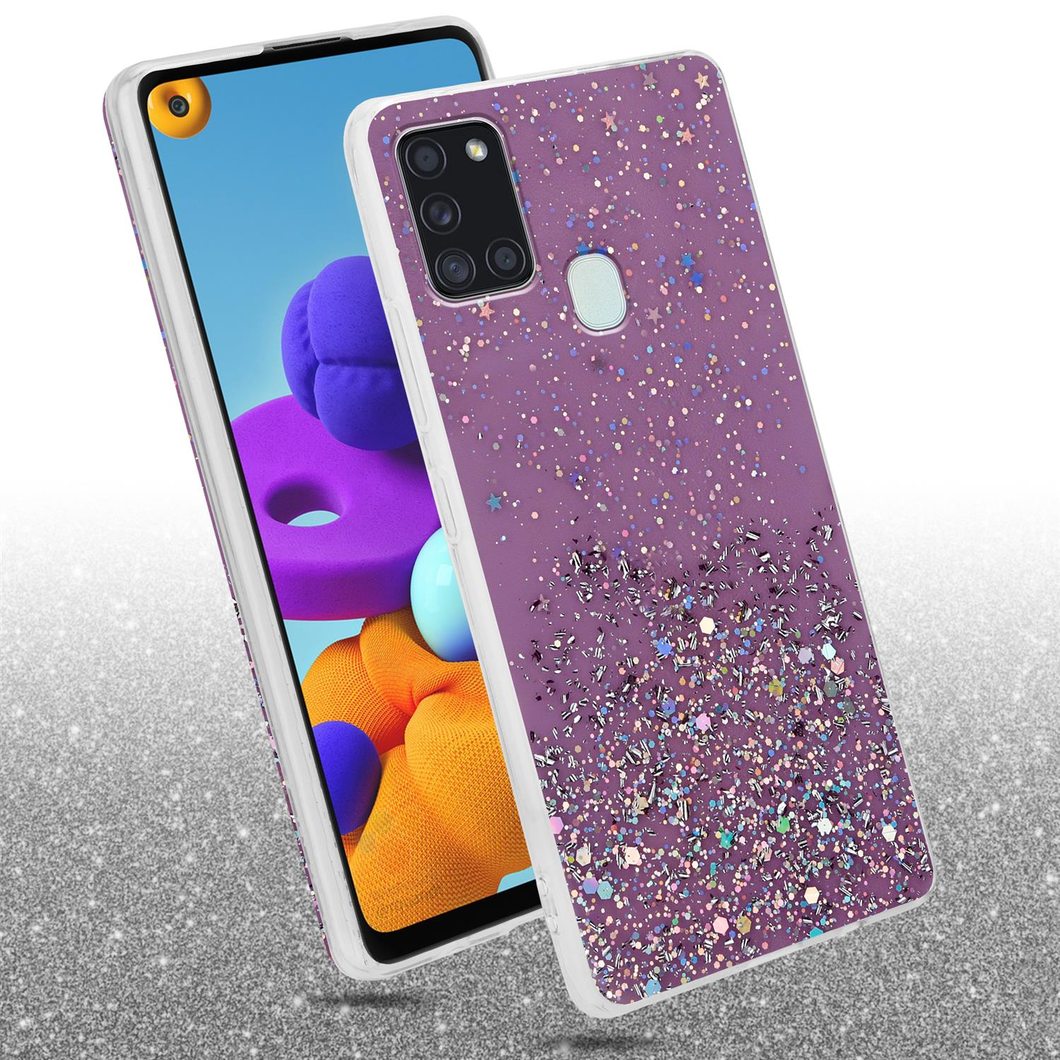 Telefon in einer glitzernden Hülle. Der Hintergrund ist verschwommen.