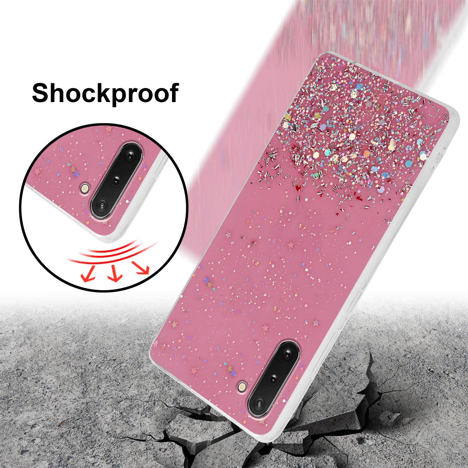 Viene mostrata una custodia per telefono rosa con brillantini, con il telefono nella custodia. La custodia è su una superficie incrinata.