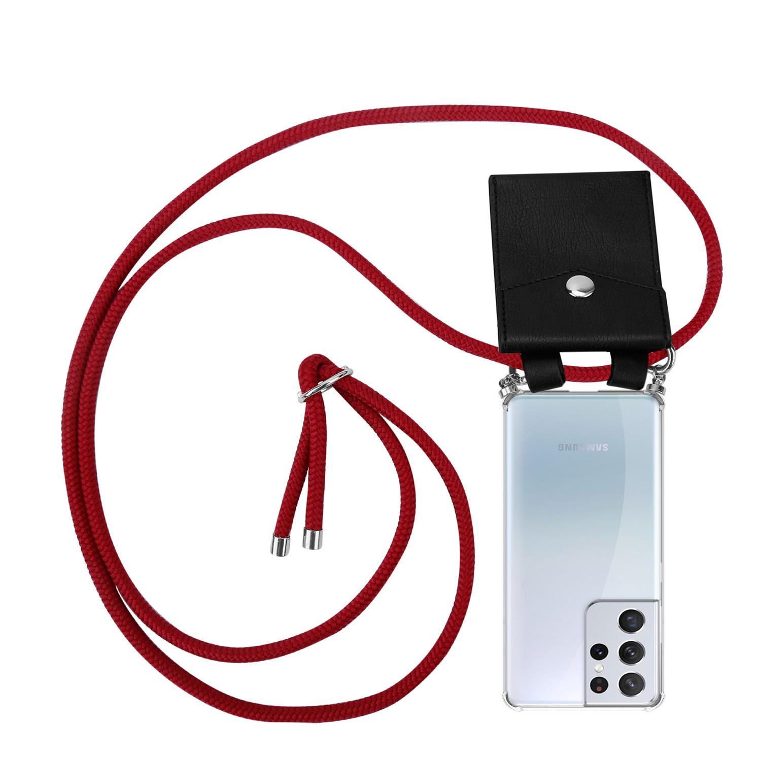 Rotes Handy-Lanyard mit schwarzem Handy-Etui und silbernem Ring an weißem Telefon.