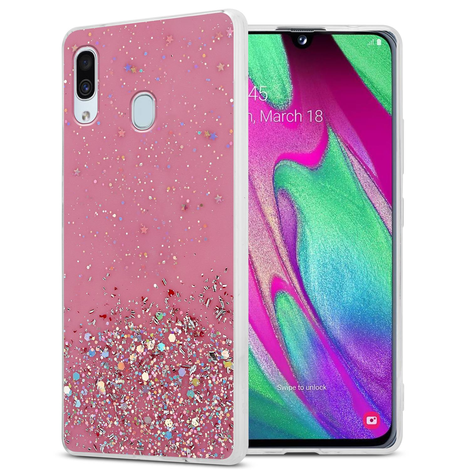 Eine pinkfarbene Handyhülle mit Glitzer. Die Hülle ist geöffnet, und der Telefonbildschirm wird angezeigt.