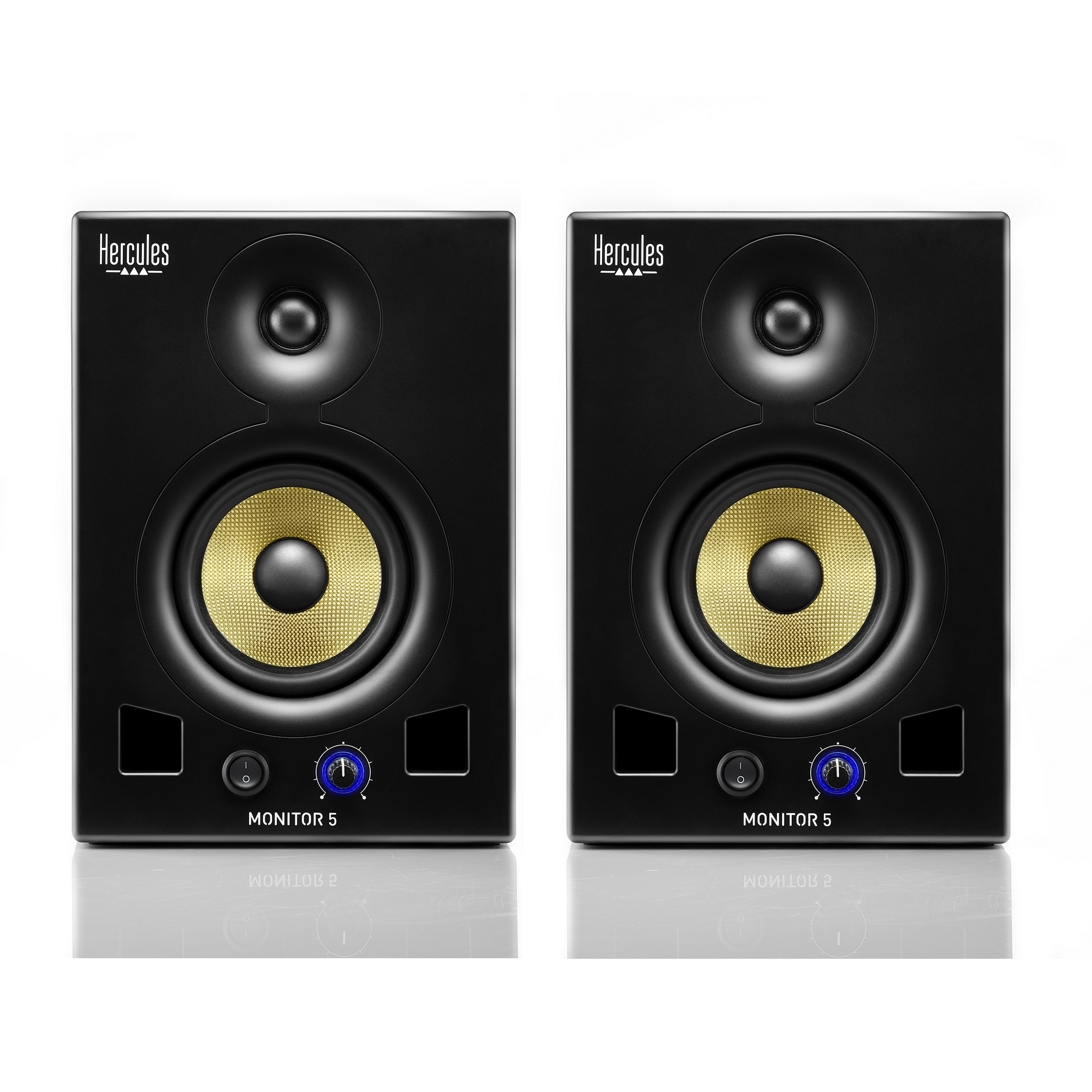 Two black studio monitor speakers. They have yellow speaker cones and blue dials.