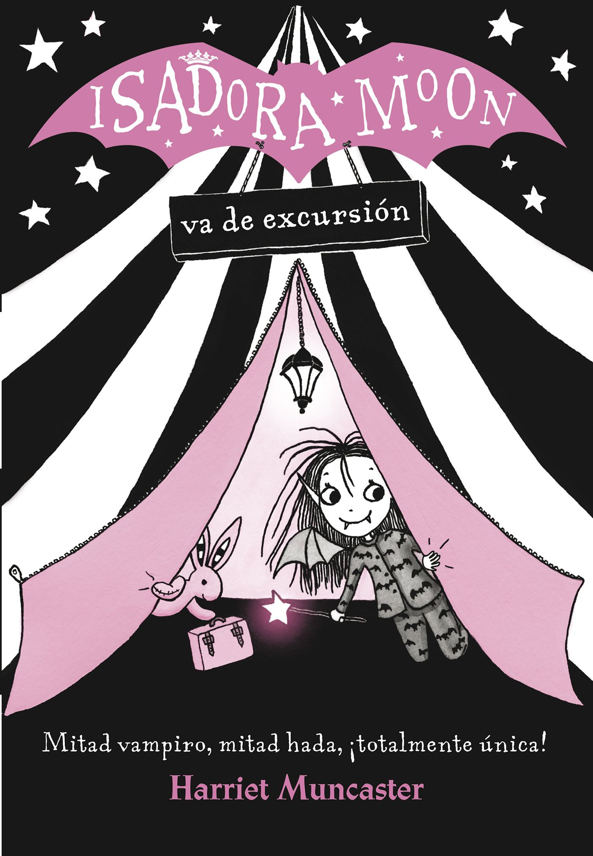 Portada del libro 'Isadora Moon'. Niña vampiro con varita en una carpa. Texto en español.