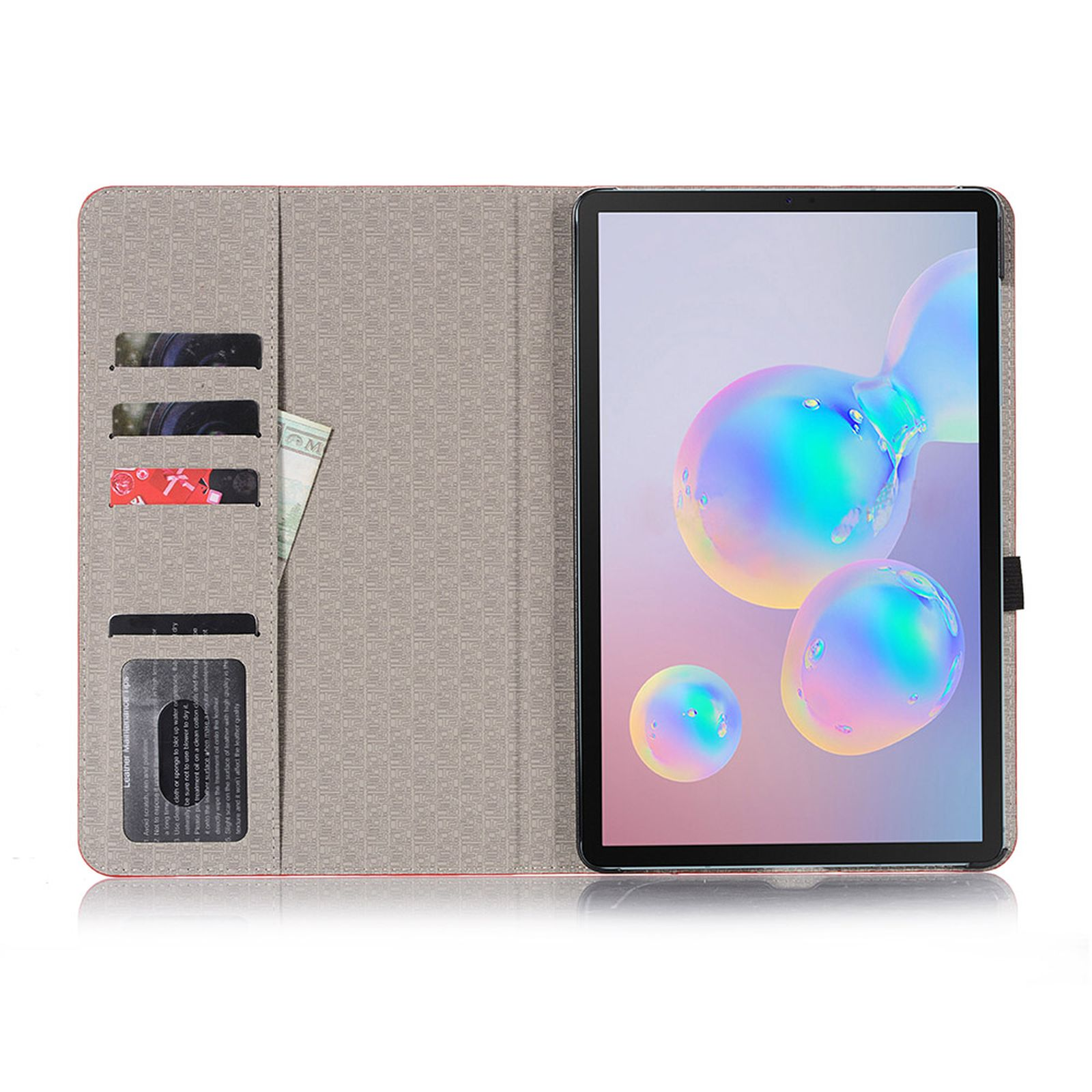 Geöffnete Tablet-Hülle, zeigt Tablet, Karten und Geld in den Taschen. Hülle ist grau und pink.