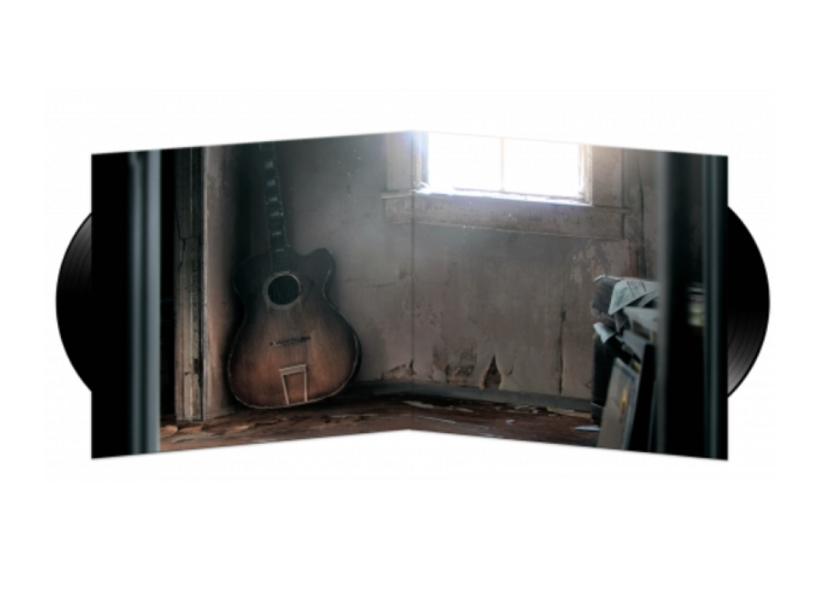 Album in vinile. Chitarra appoggiata al muro. Finestra e luce. Interno grunge.