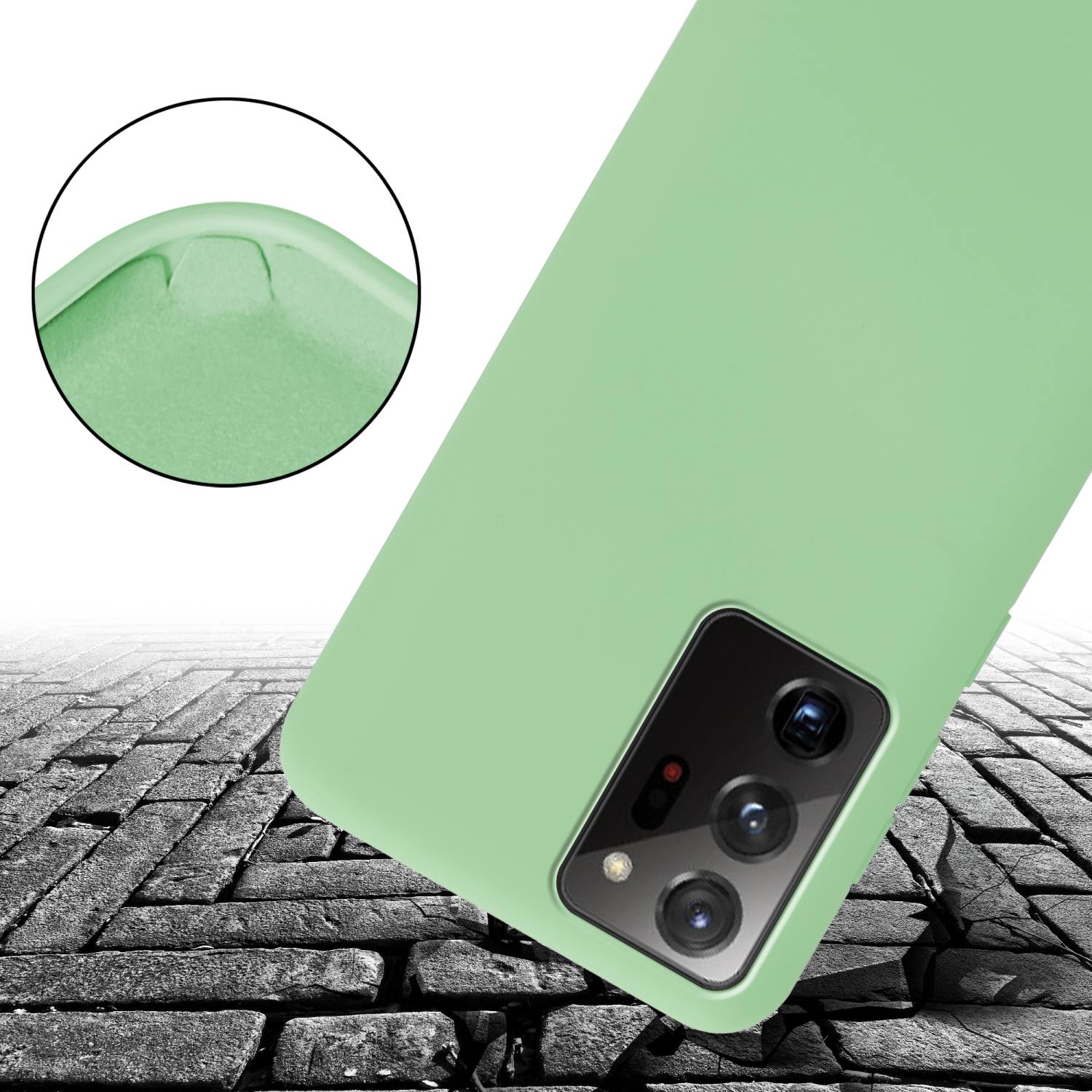 Una custodia per telefono verde chiaro è su una superficie di mattoni. Un dettaglio circolare mostra il bordo.