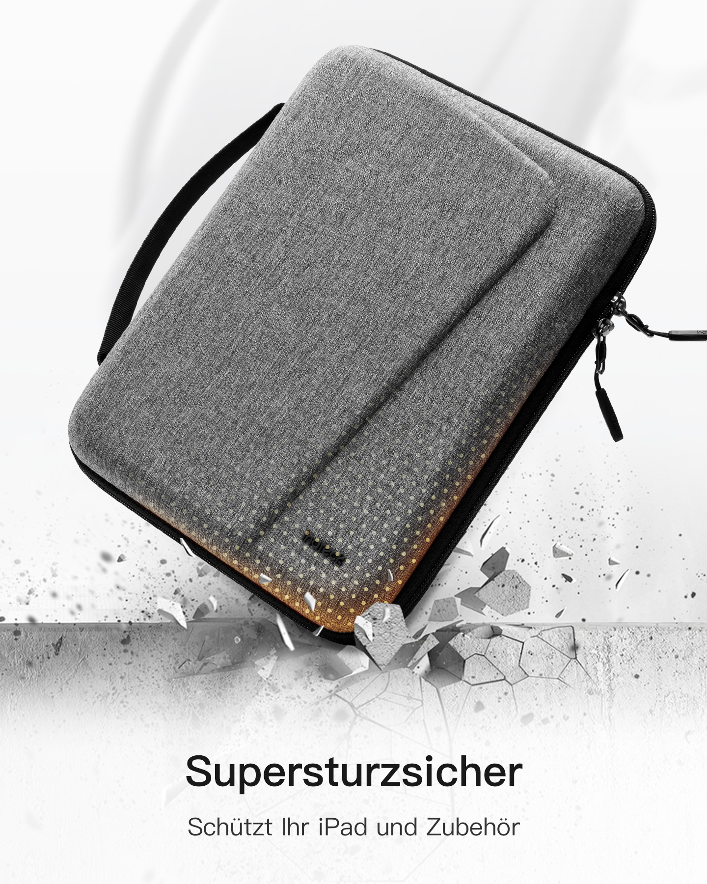 Eine graue iPad-Hülle mit Reißverschluss, die fallen gelassen wird, mit Trümmern und Aufprallspuren auf dem Boden.