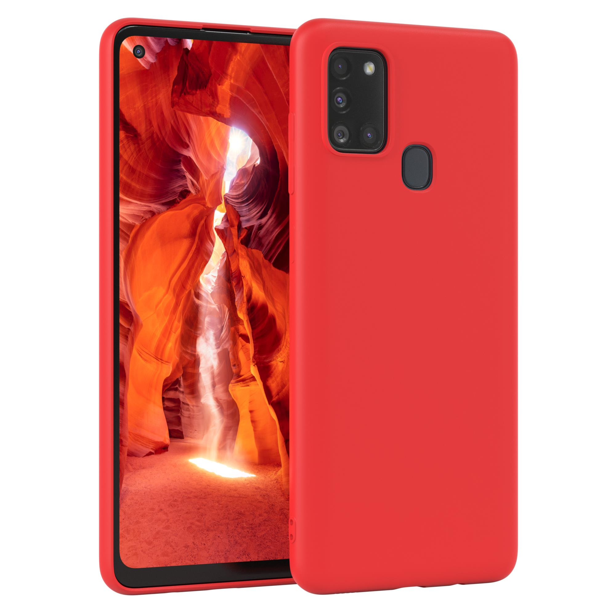 Rotes Smartphone mit Kamerahügel. Ein zweites Telefon ist dahinter zu sehen.