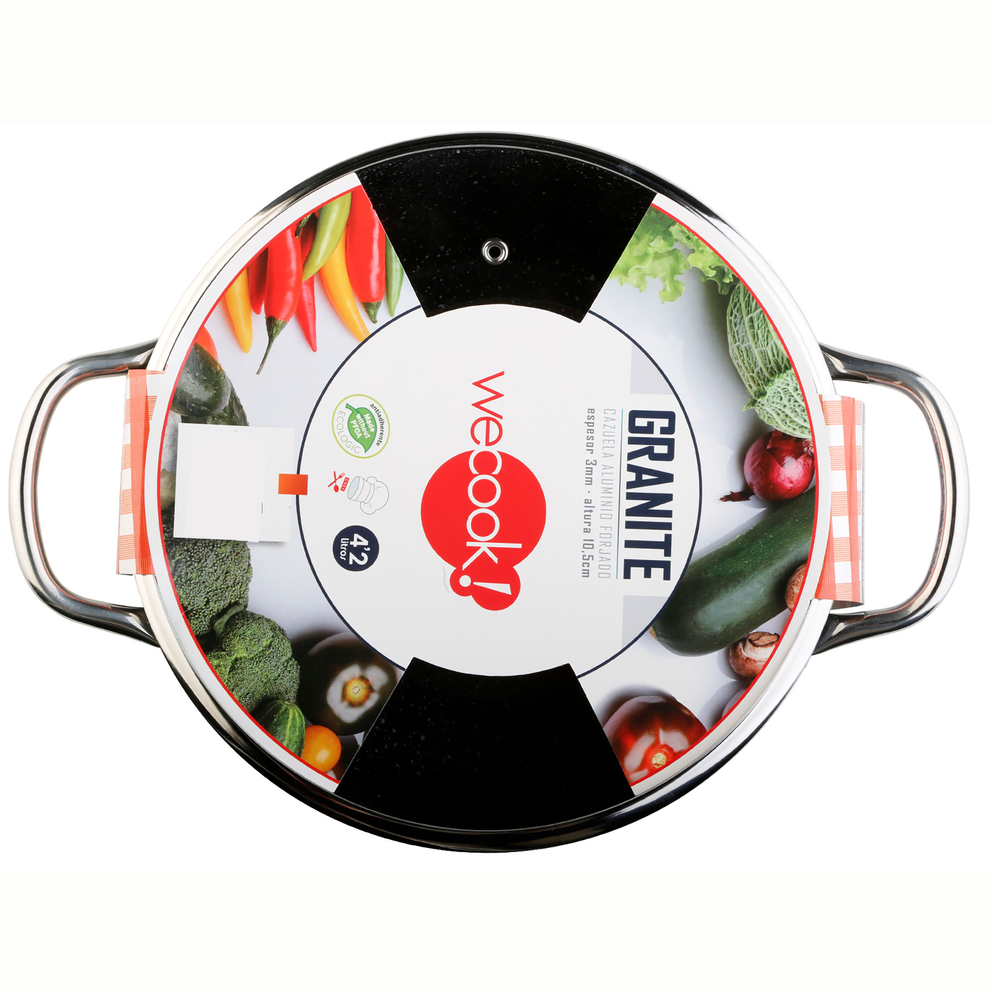Una olla cubierta de granito con tapa de vidrio sobre una superficie blanca. Verduras y texto visibles en la tapa.